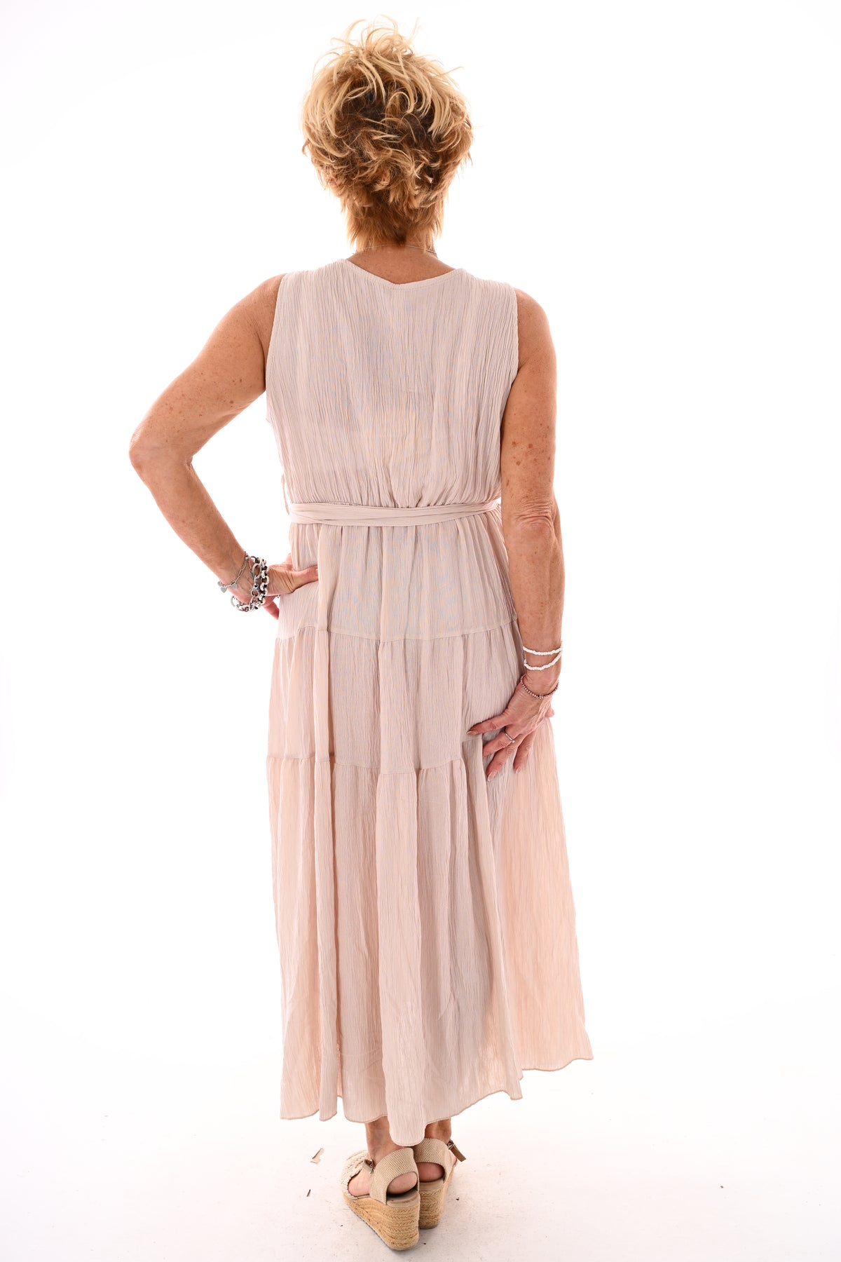 Lange jurk stroken mouwloos uni beige
