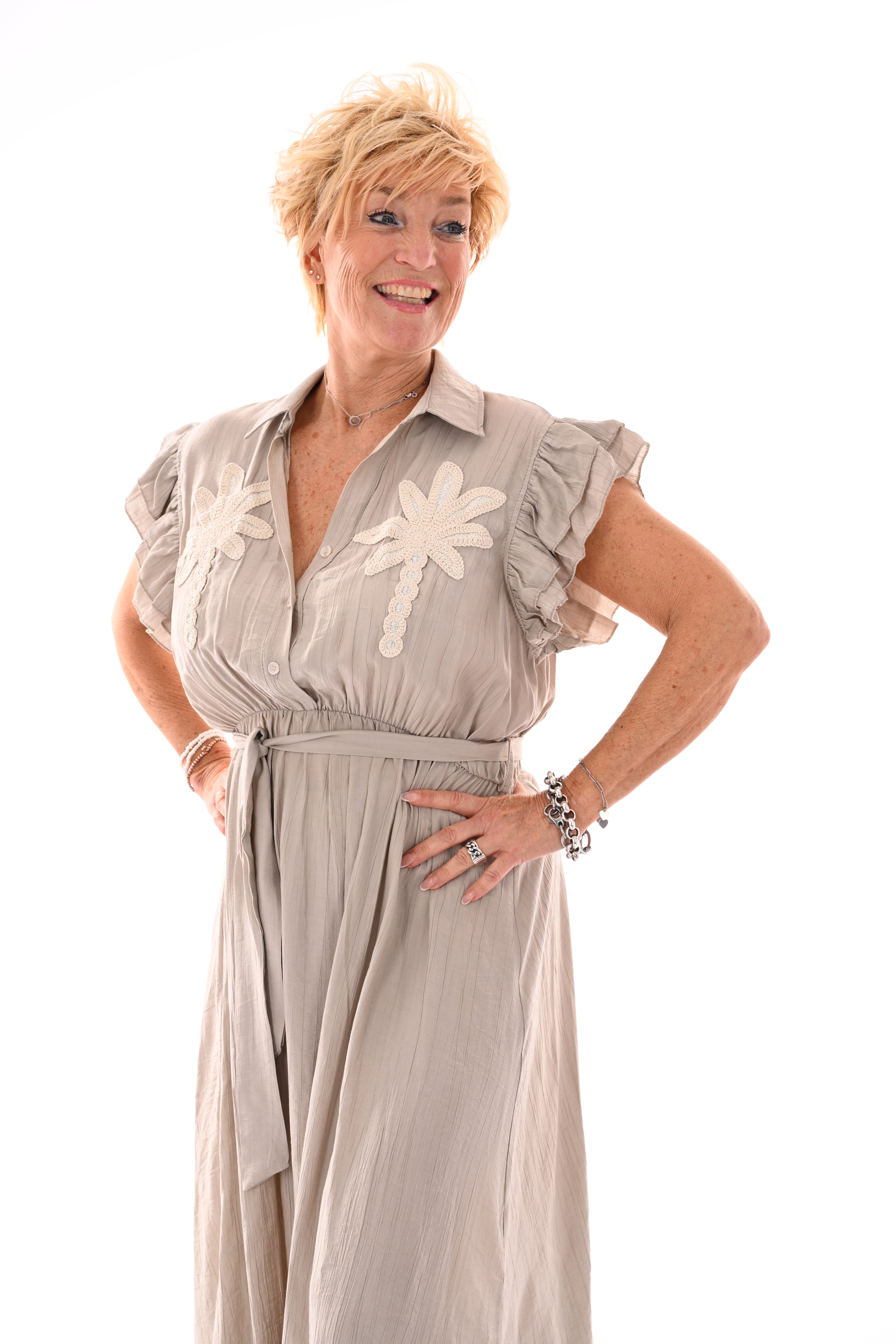 Lange jurk roezels en palms uni taupe