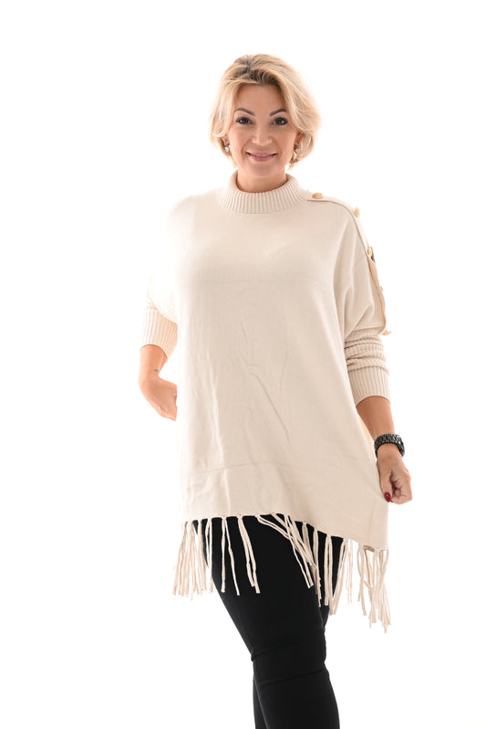 Oversized trui turtle knopen en franjes creme