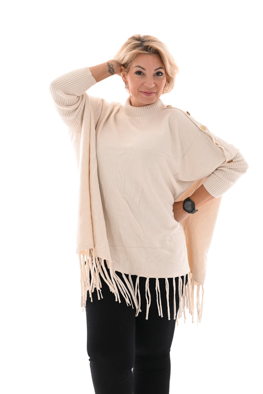 Oversized trui turtle knopen en franjes creme