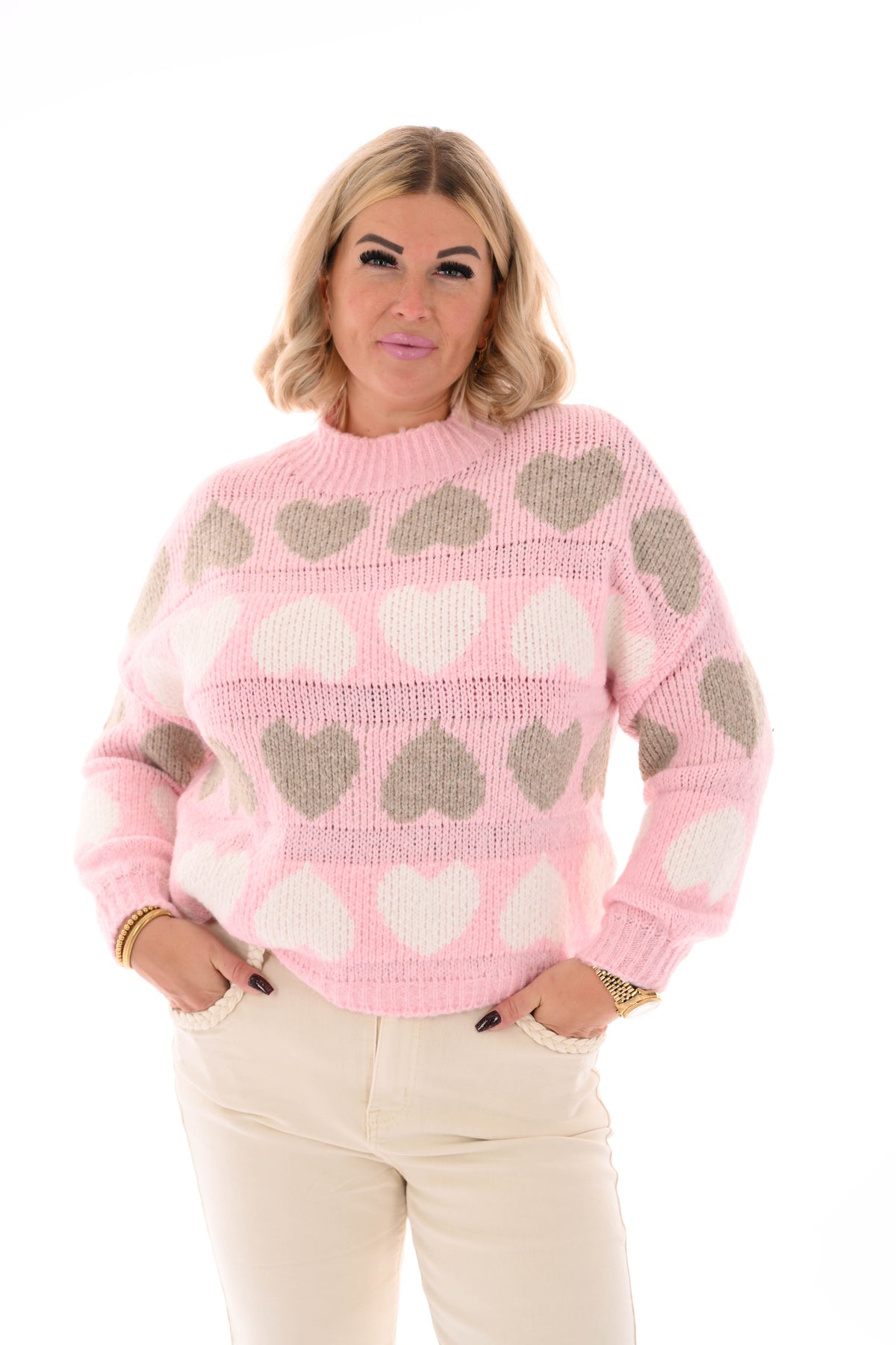 Gebreide trui ronde hals hartjes lichtroze