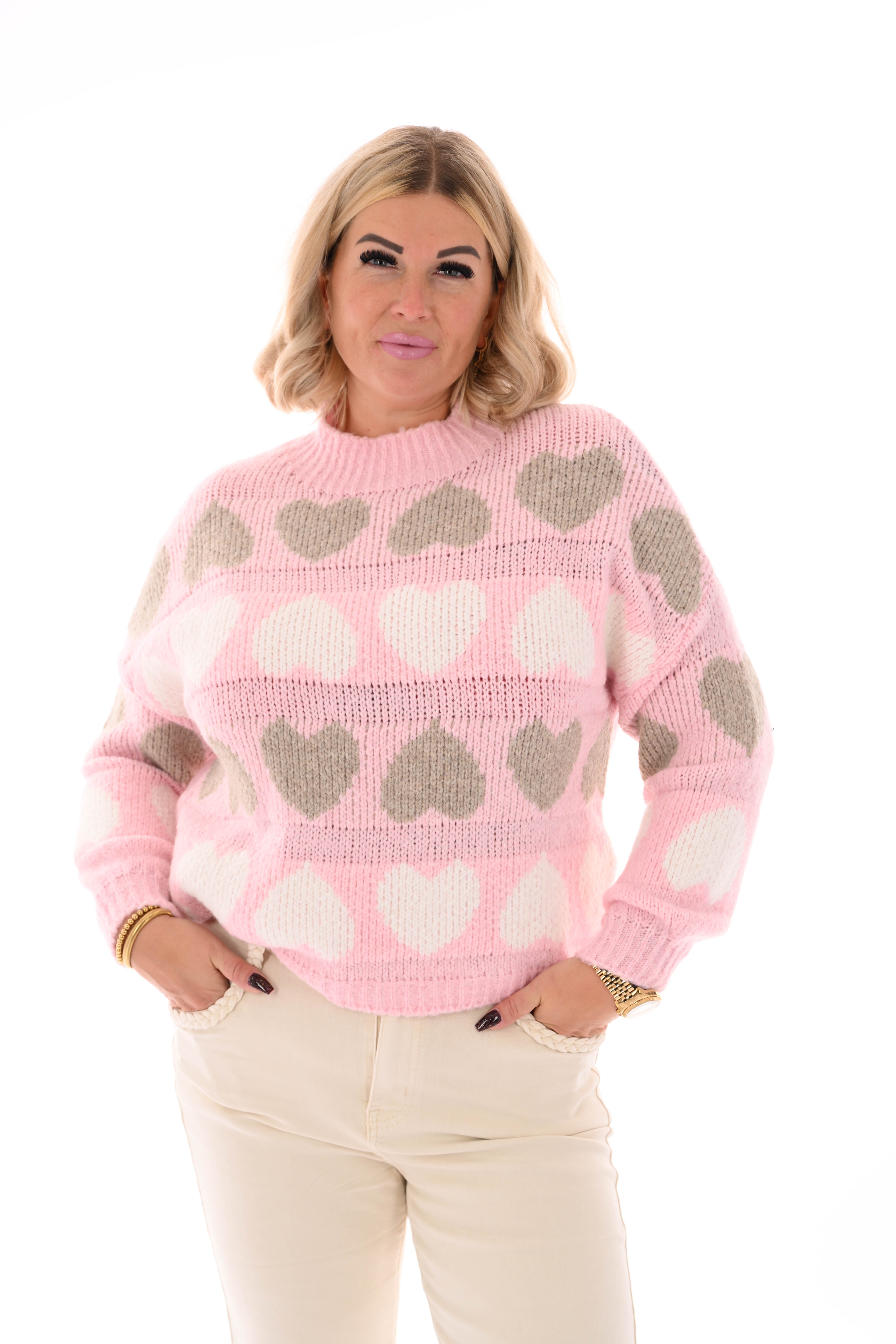 Gebreide trui ronde hals hartjes lichtroze