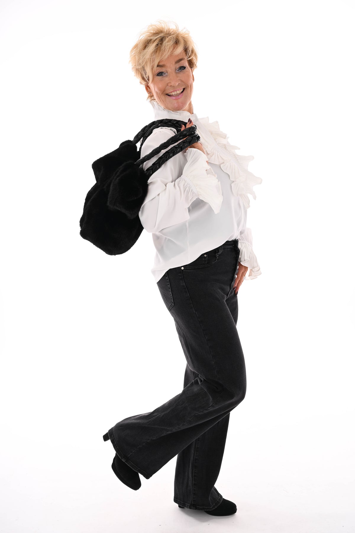 Doorknoop blouse roezels roomwit