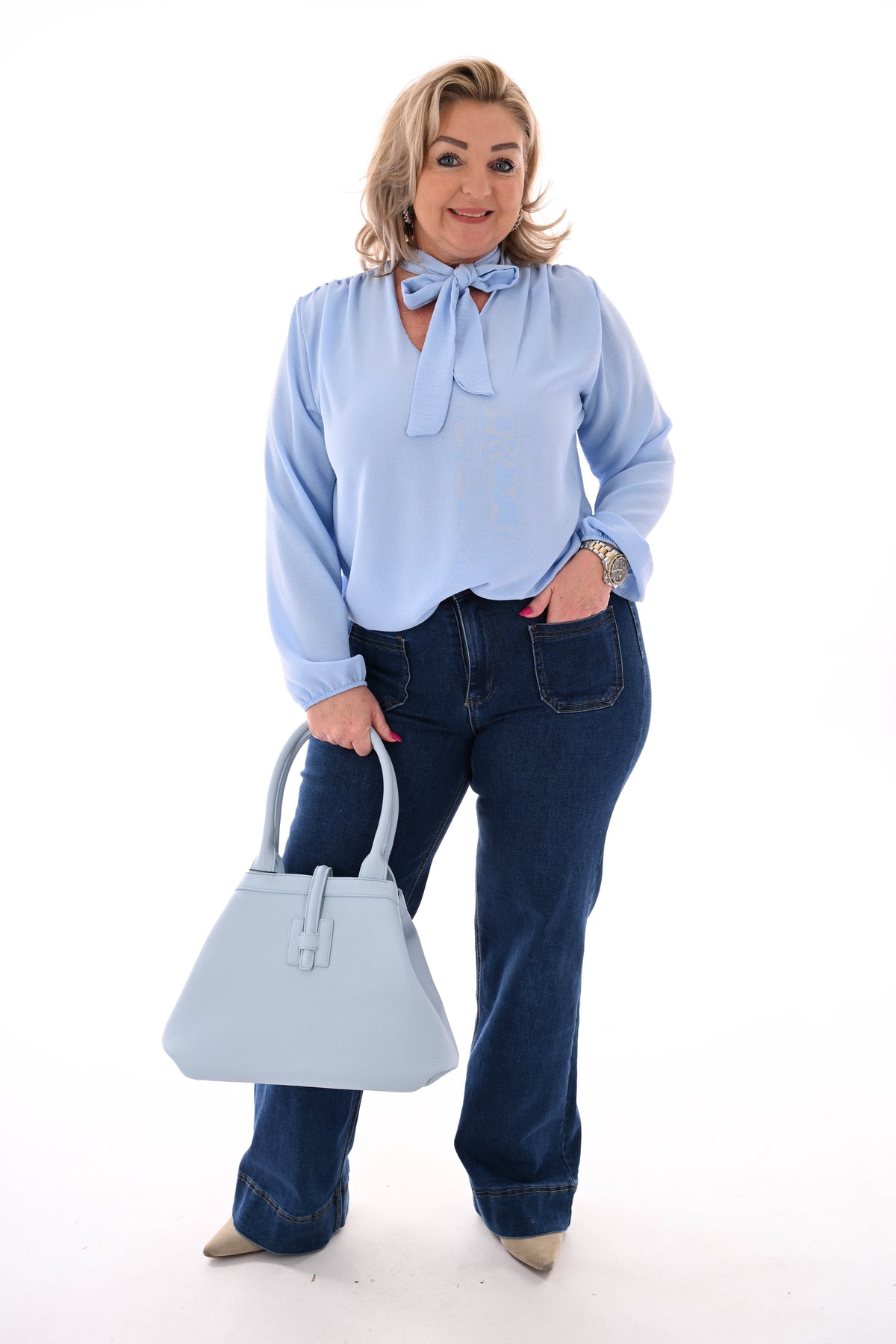 Top lange mouwen met strik lichtblauw