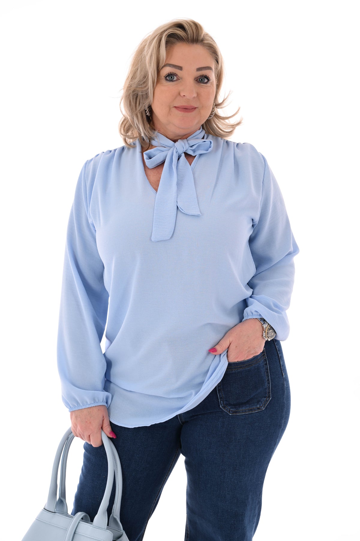 Top lange mouwen met strik lichtblauw