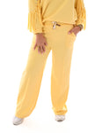 Wijde joggingsbroek met naad uni geel