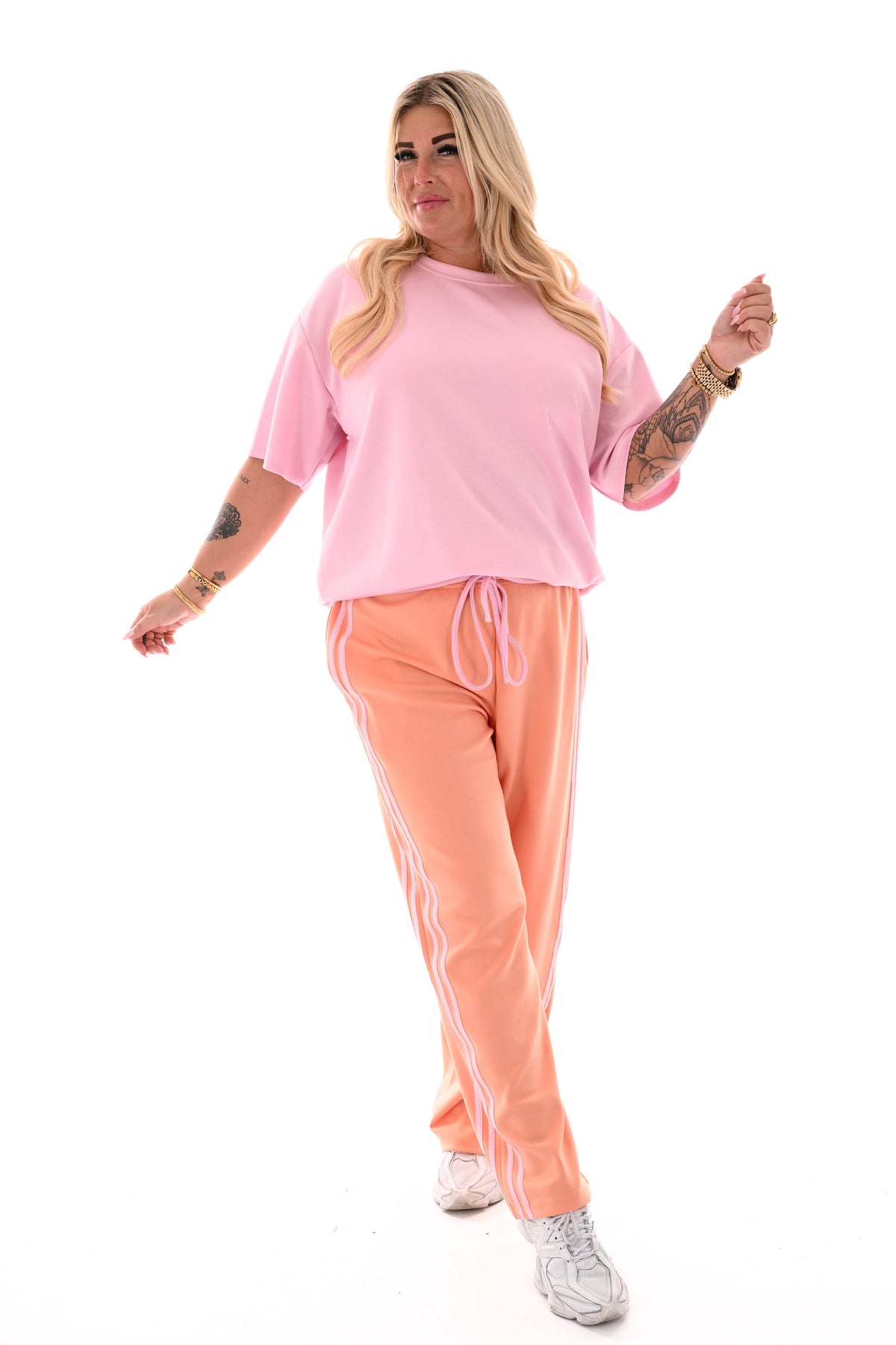 Broek wijde pijpen met bies oranje