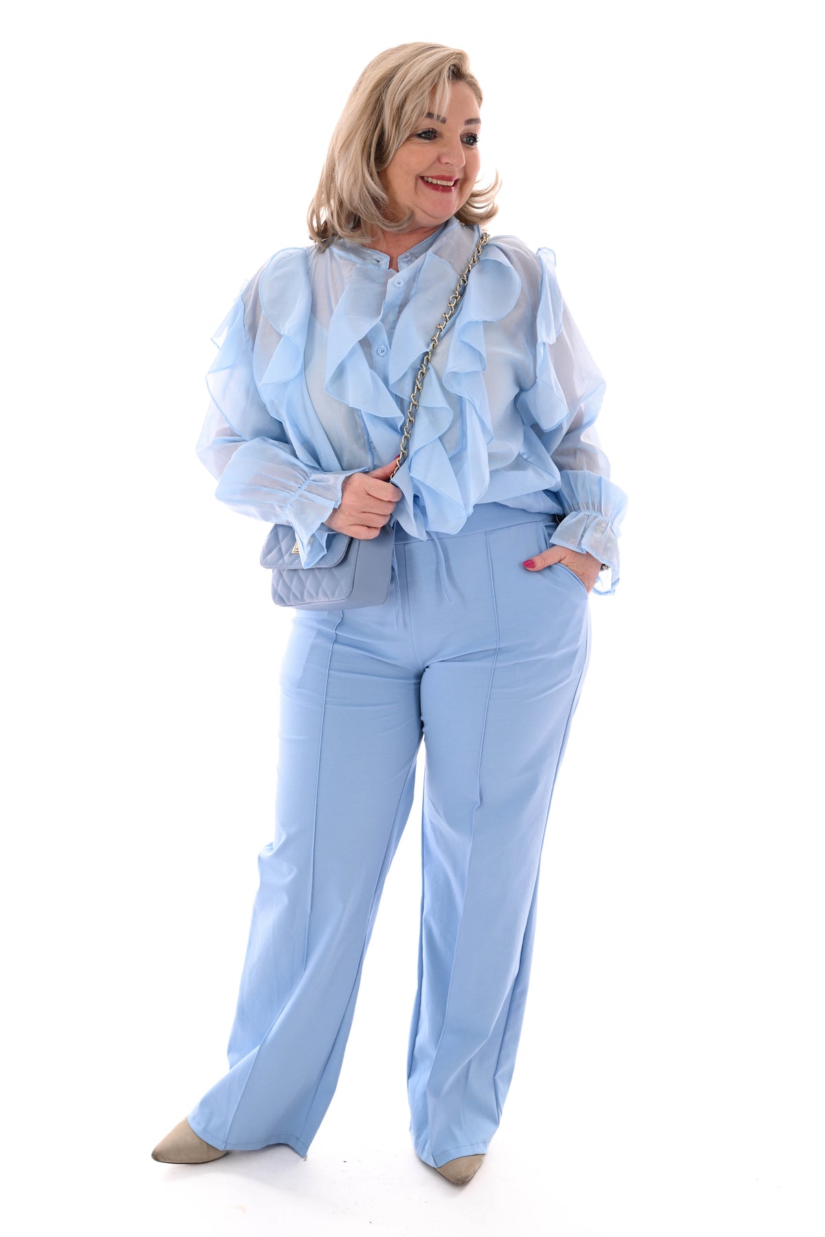 Blouse roezels lichtblauw