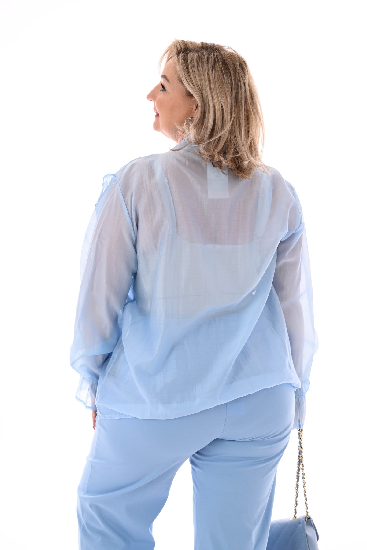 Blouse roezels lichtblauw