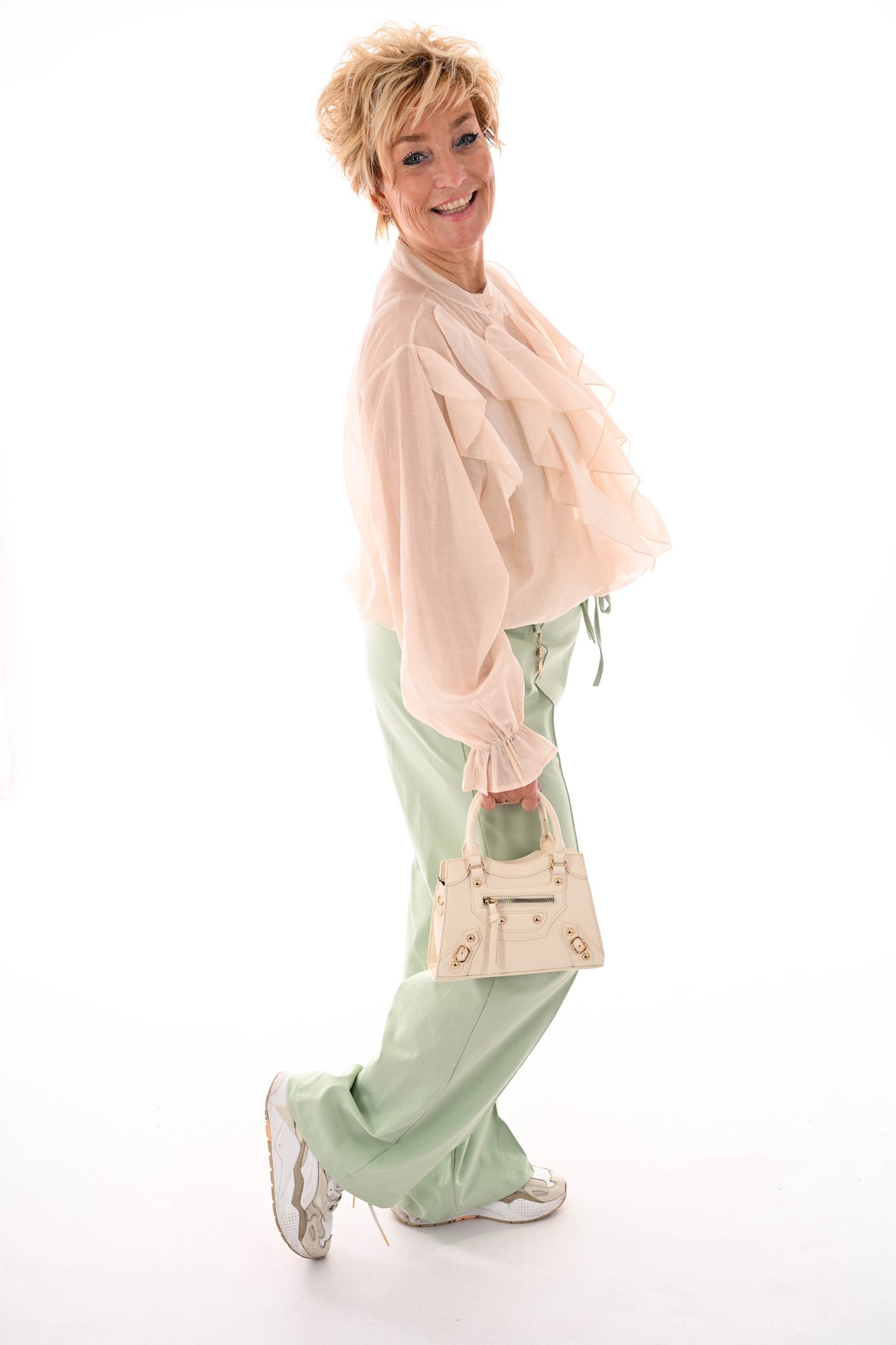 Blouse roezels beige
