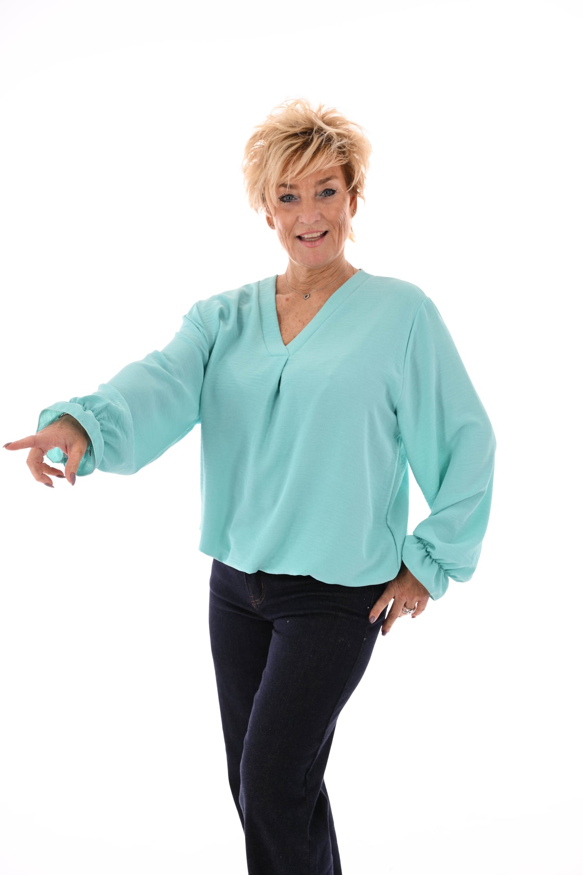 Top trompetmouwen v-hals uni turquoise