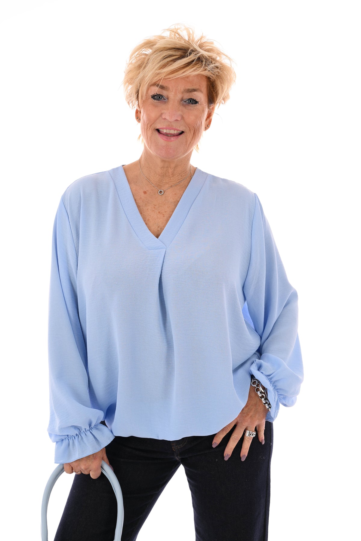 Top trompetmouwen v-hals uni lichtblauw