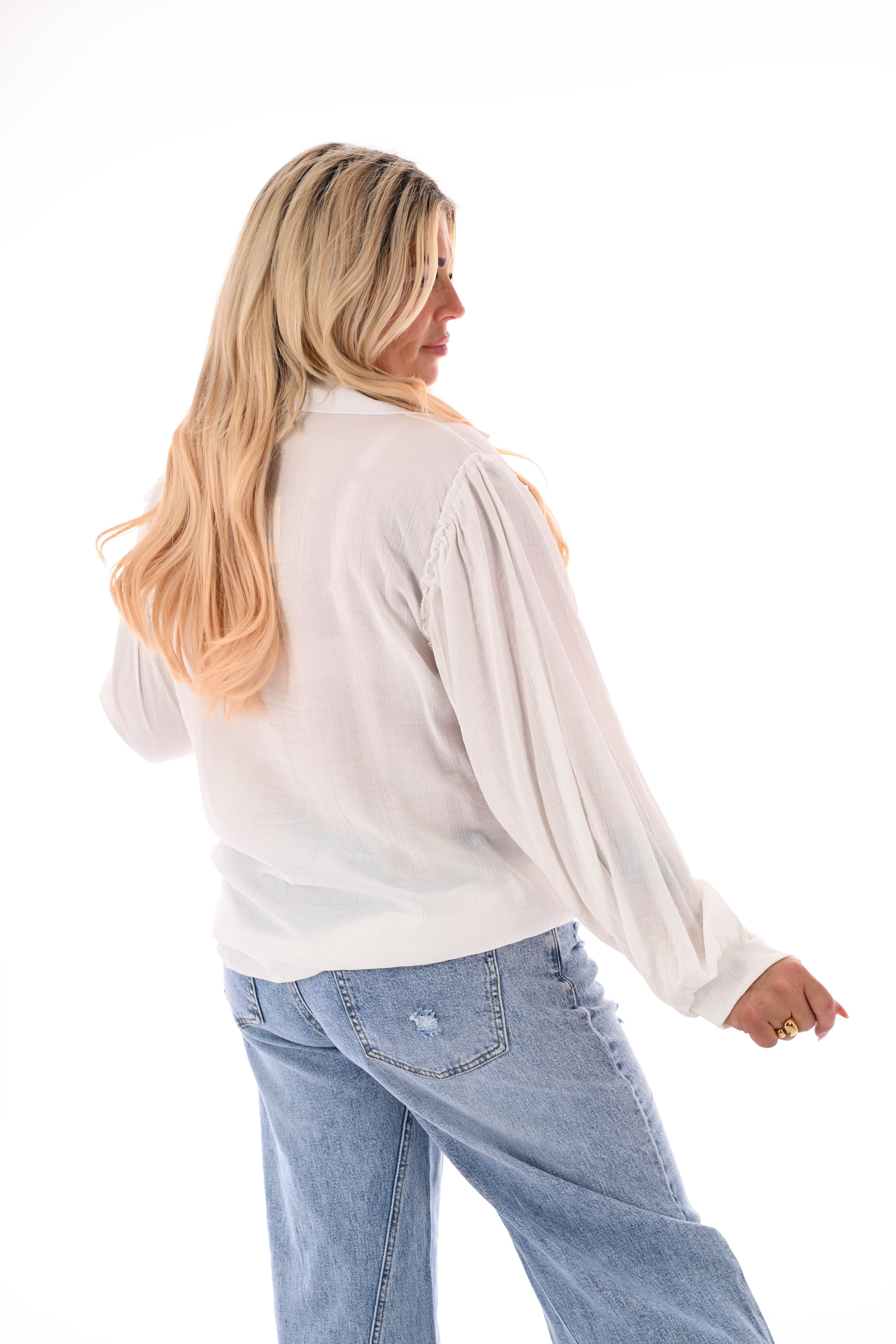 Blouse met roezelranden roomwit