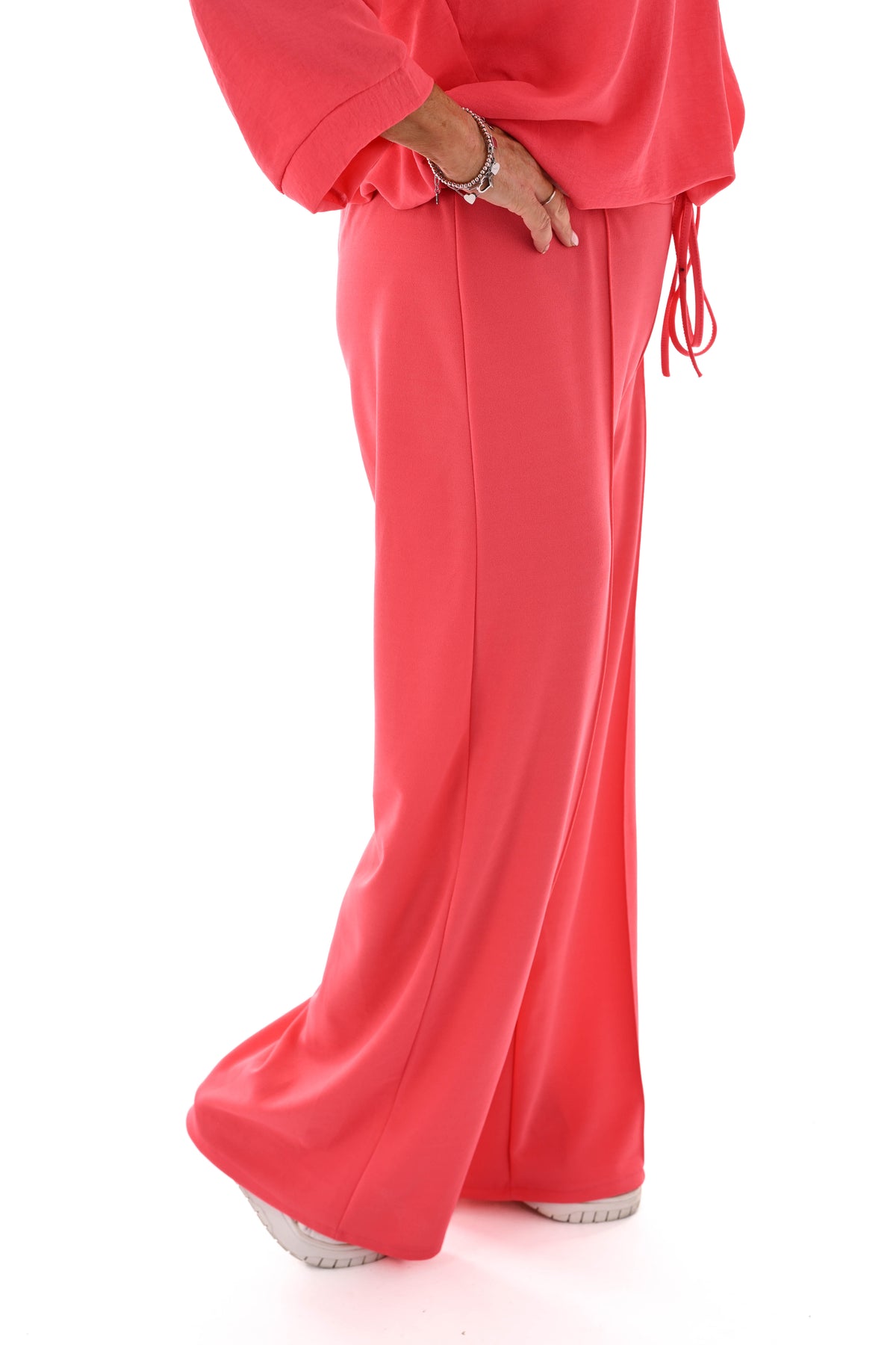 Wijde broek elastieken band met naad uni koraal