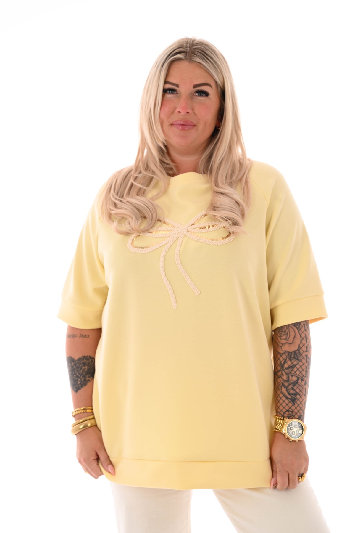 Sweater korte mouwen met strik botergeel