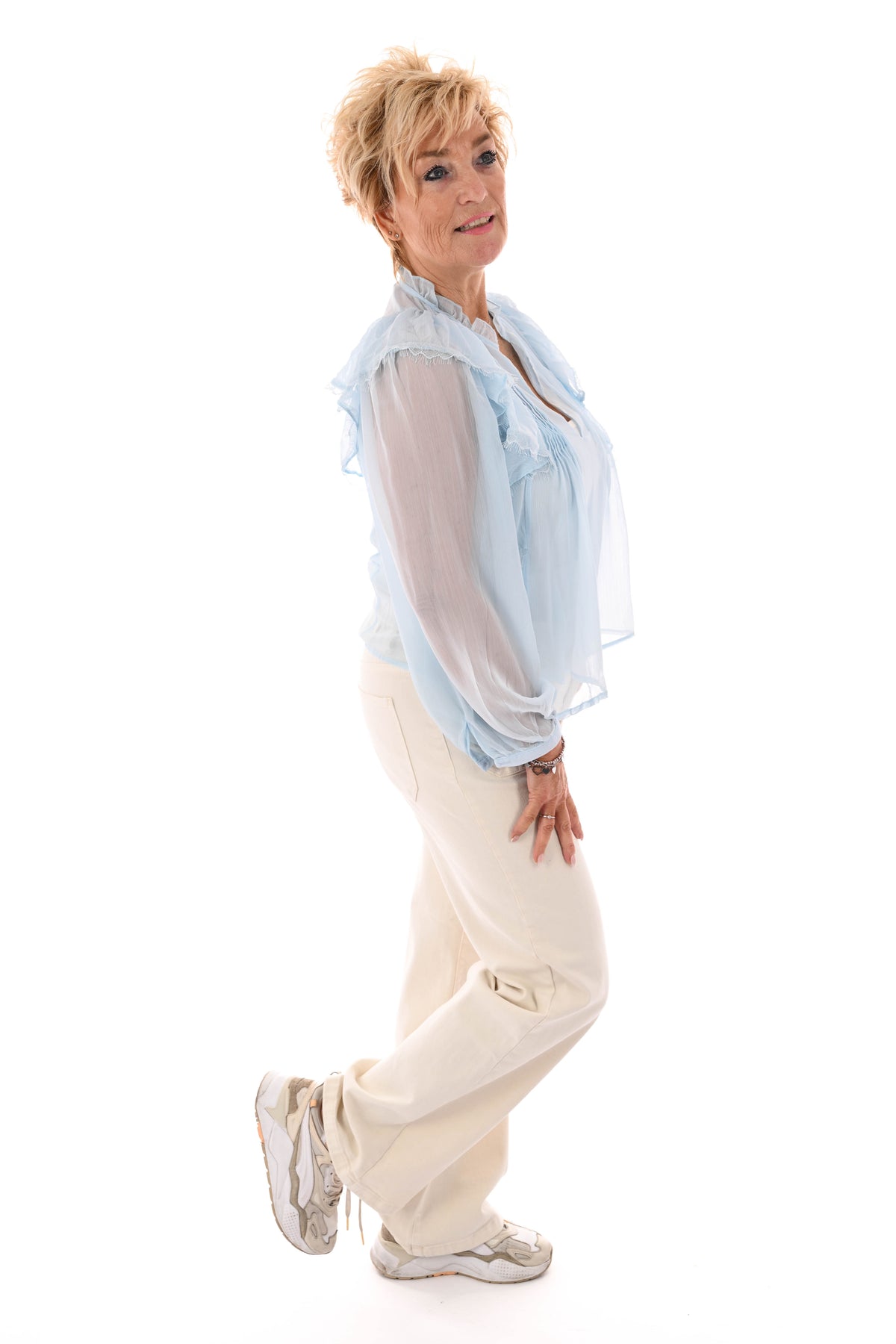 Blouse ruffels lichtblauw