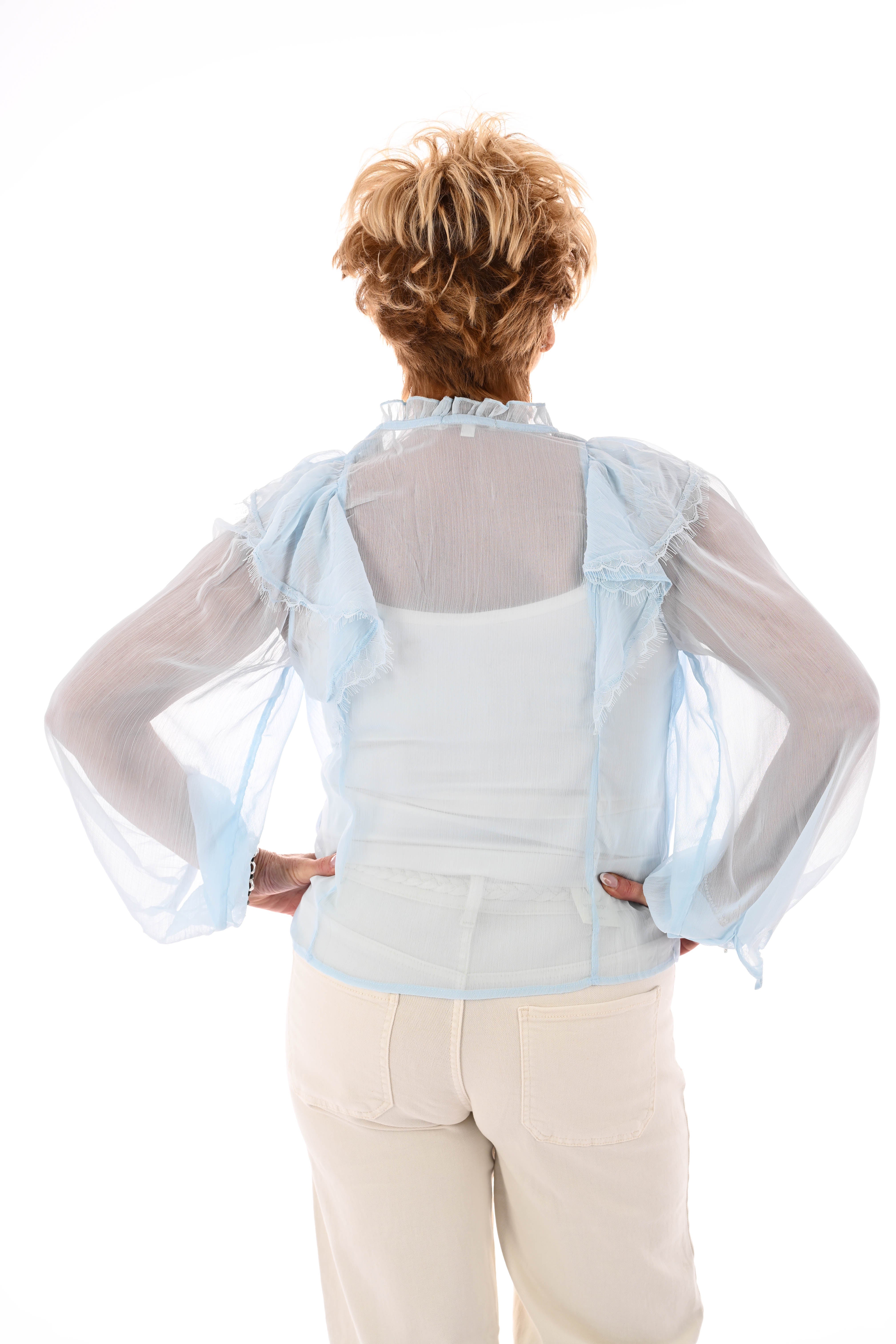 Blouse ruffels lichtblauw