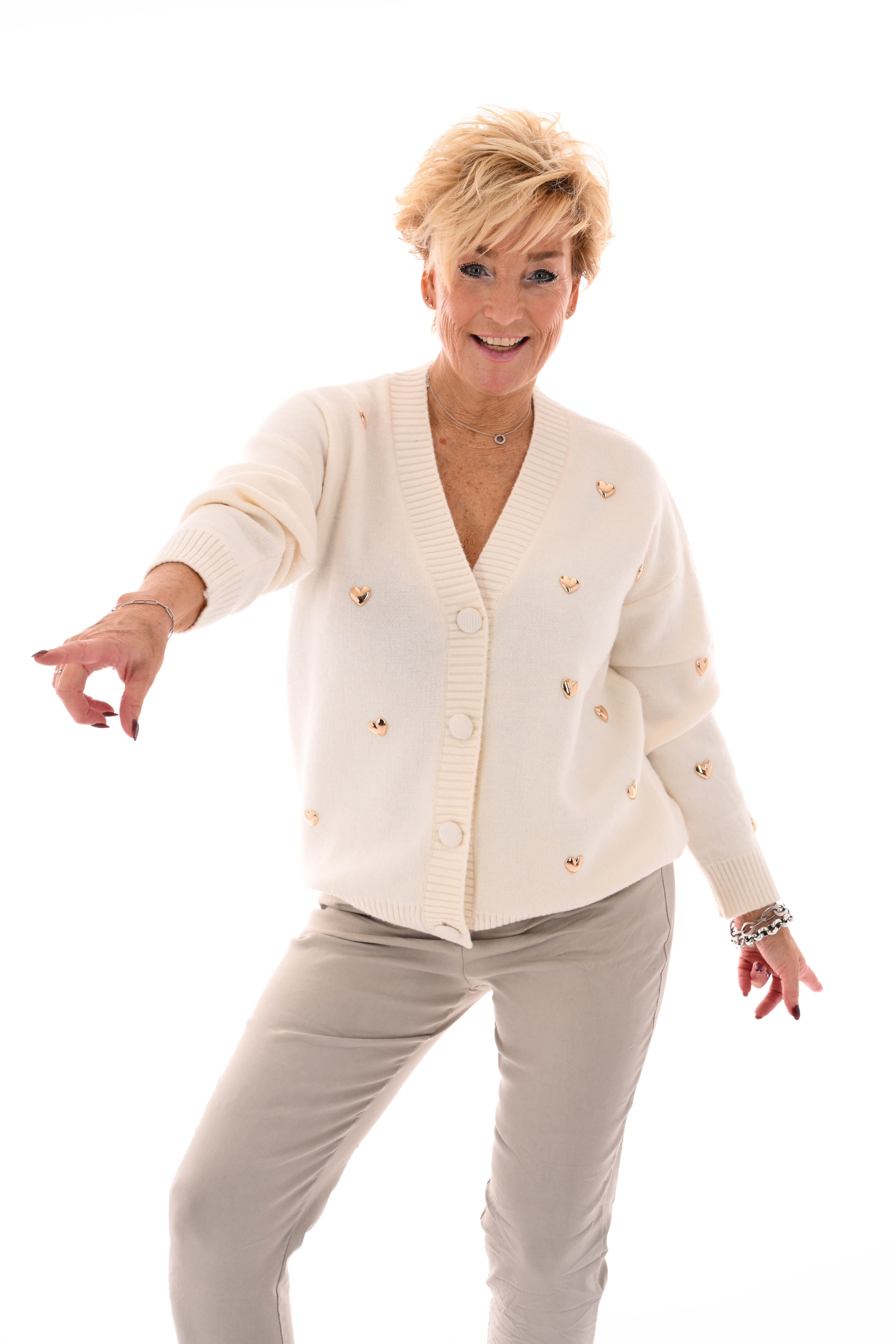 Kort vest hartjes v-hals creme