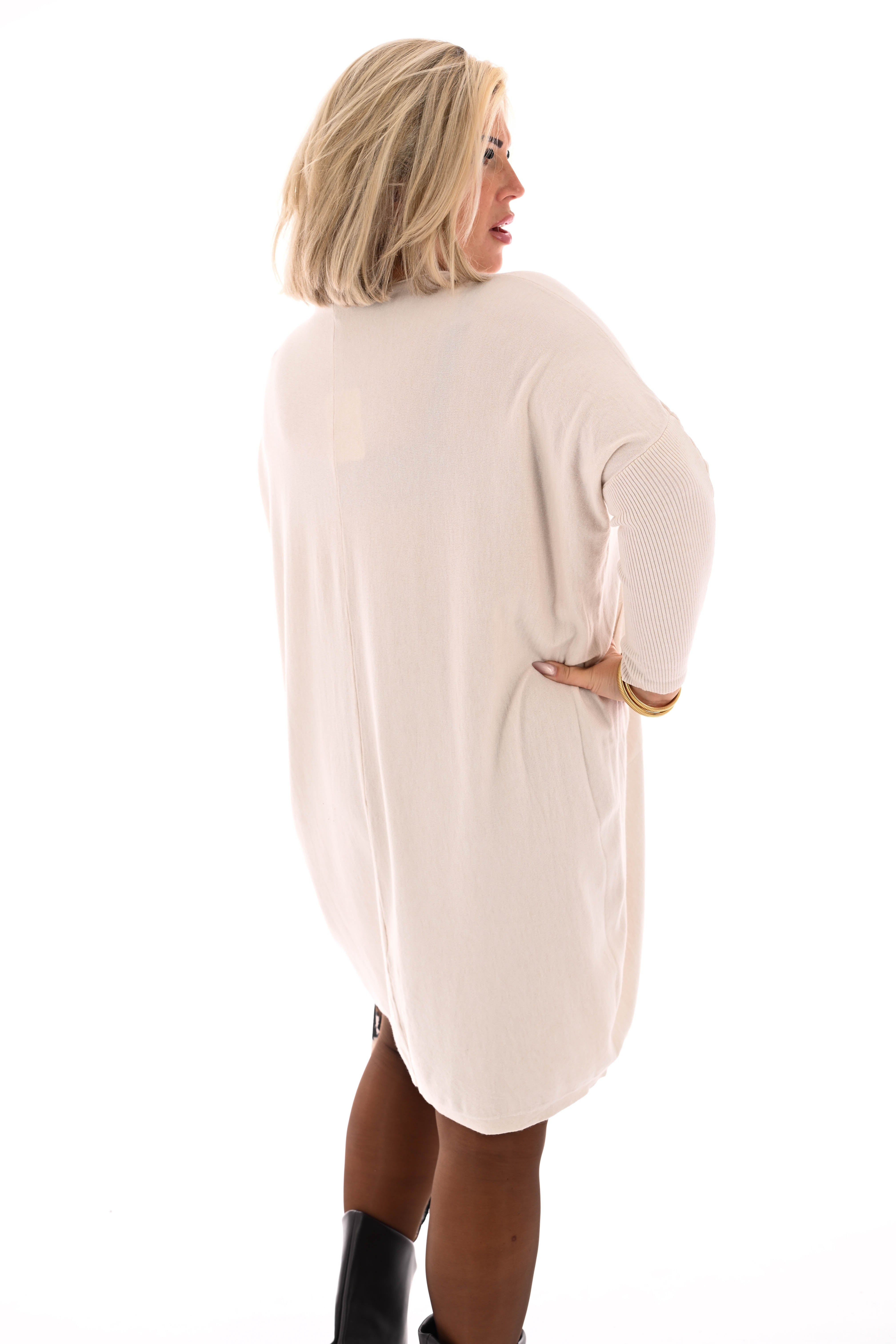 Basic trui met zakjes creme