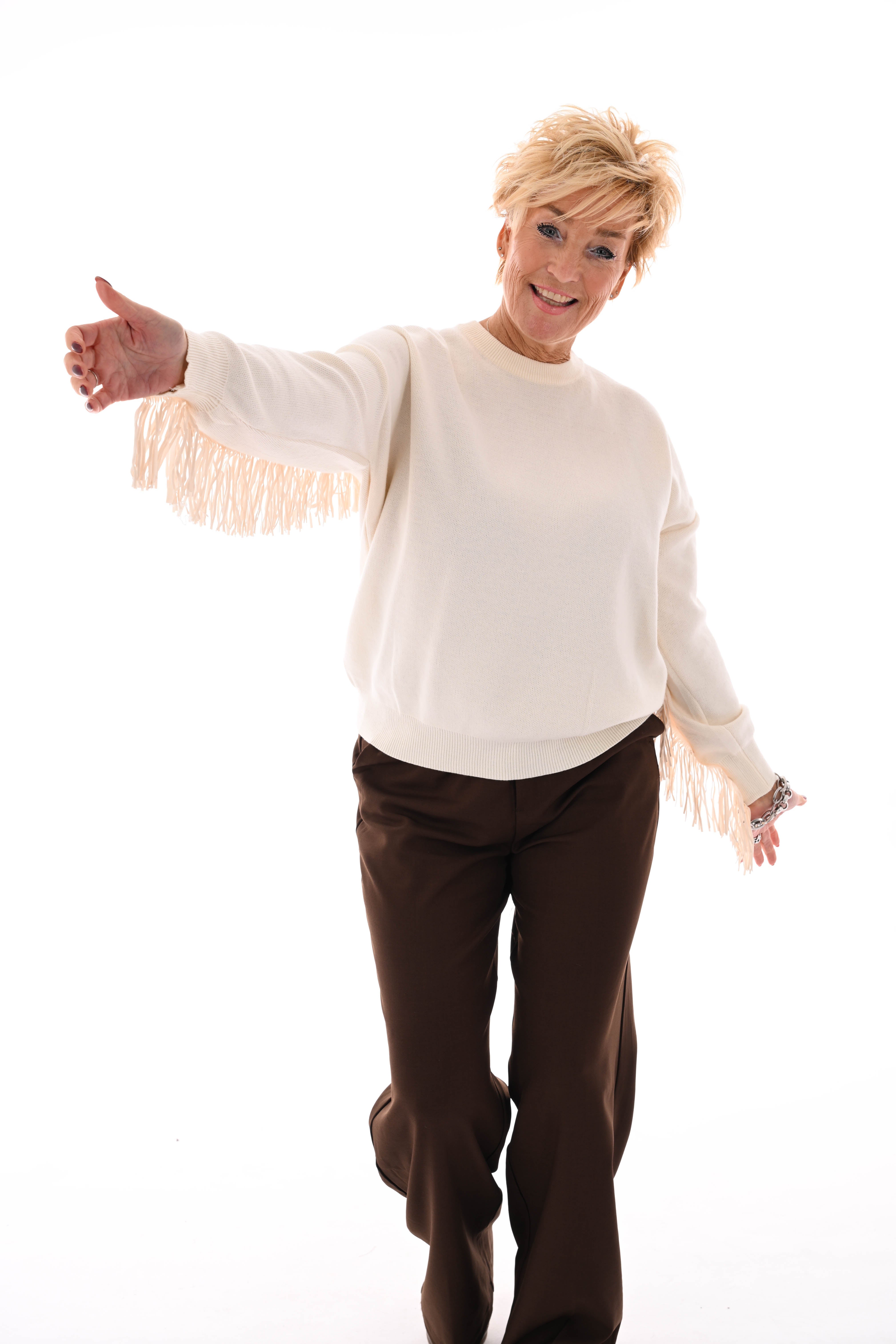 Trui ronde hals franjes met studs creme