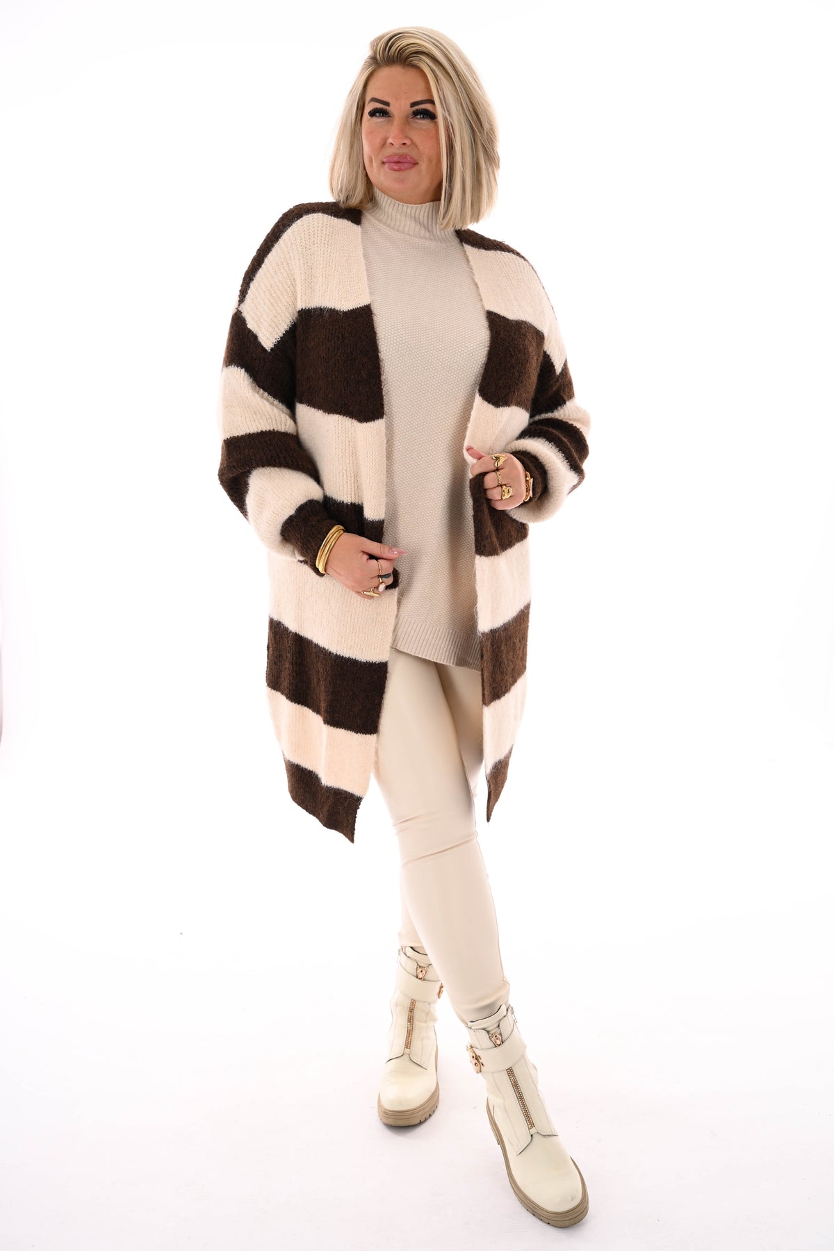 Half lang vest gestreept met pofmouwen bruin/roomwit