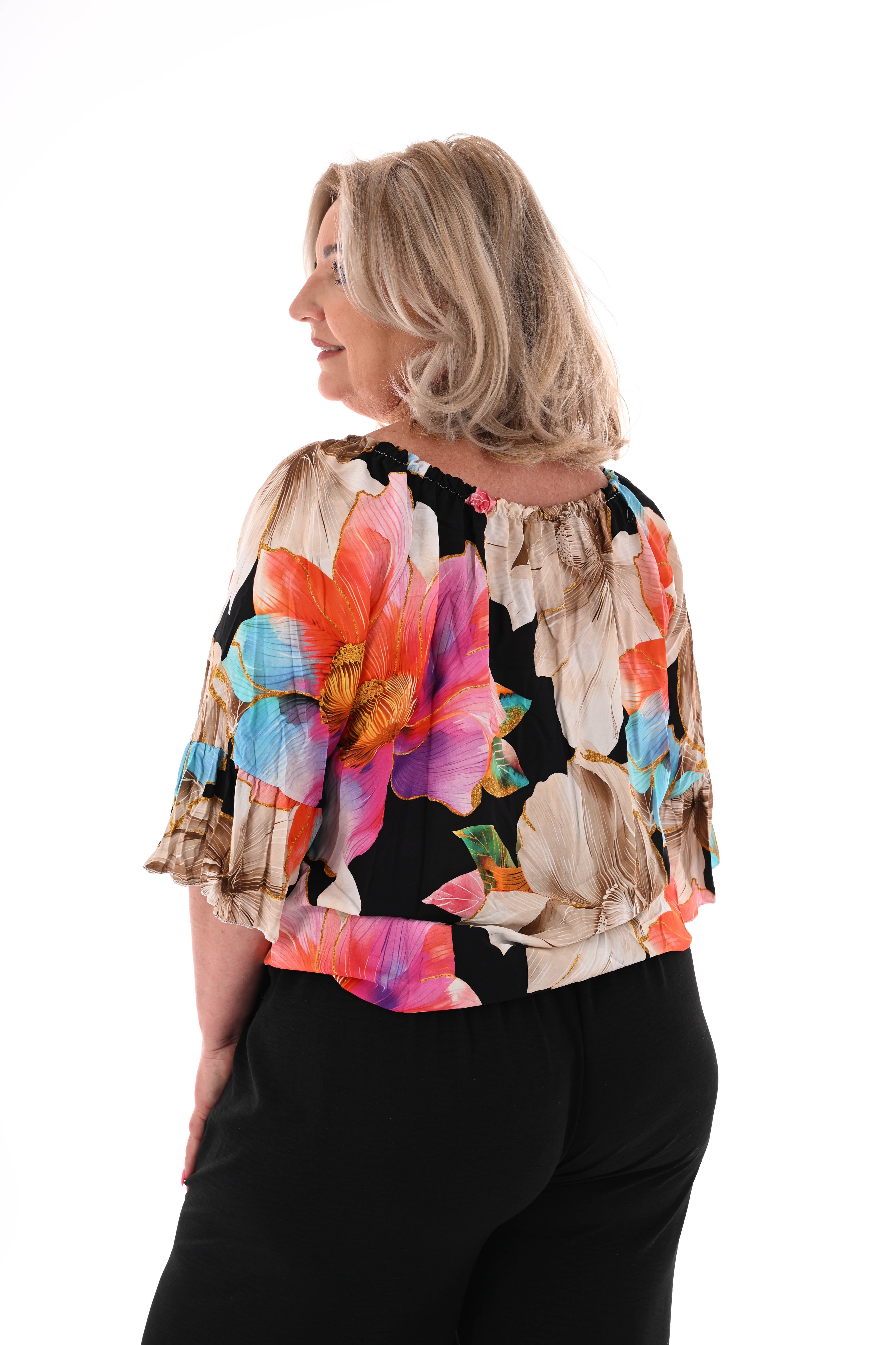 Blouse met bloemen en trompetmouwen zwart