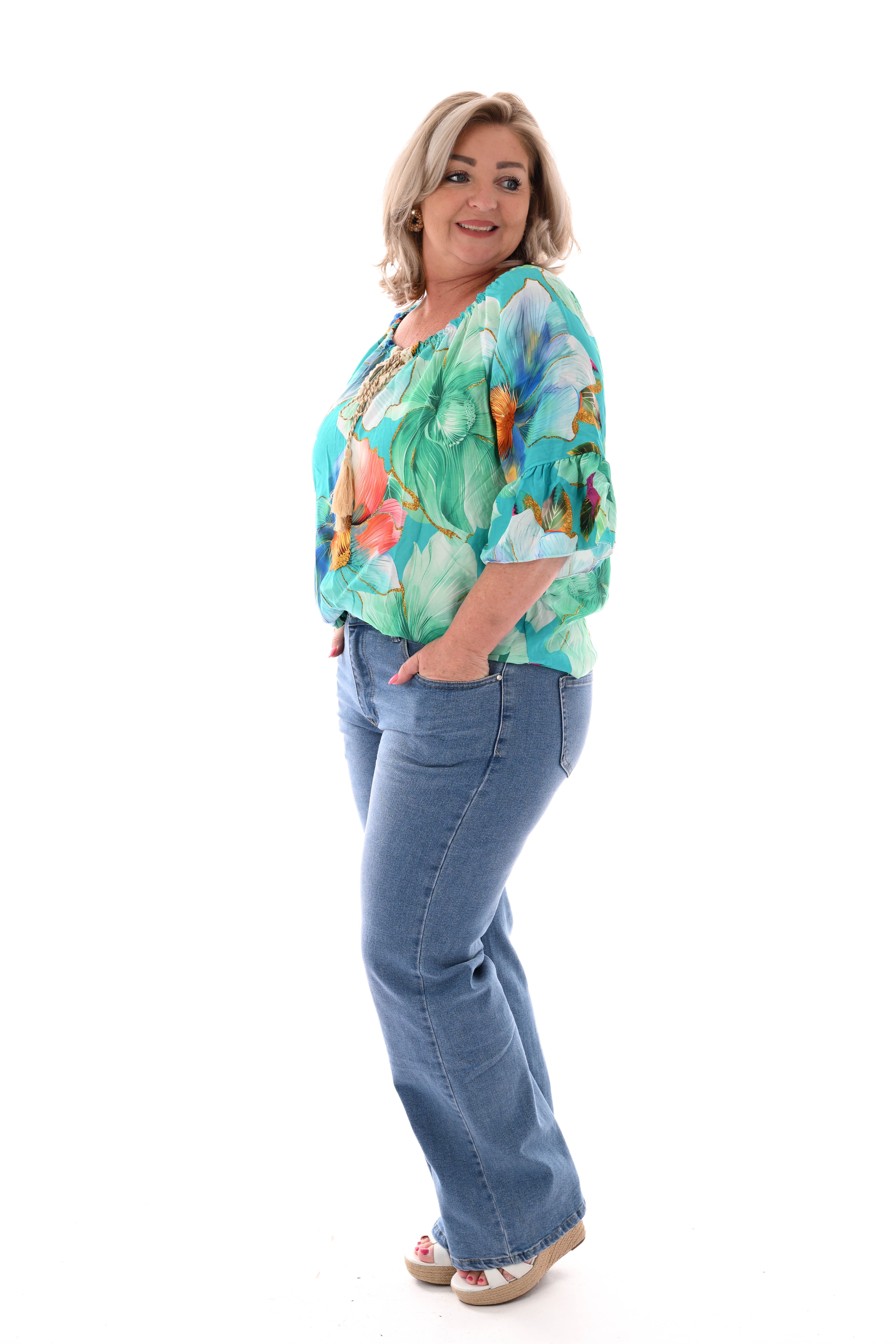 Blouse met bloemen en trompetmouwen aquablauw