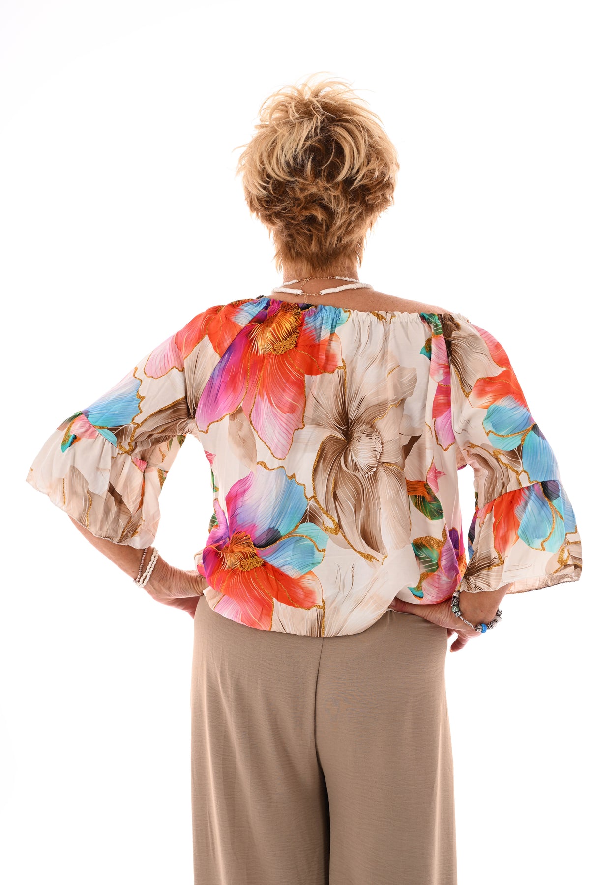 Blouse met bloemen en trompetmouwen beige