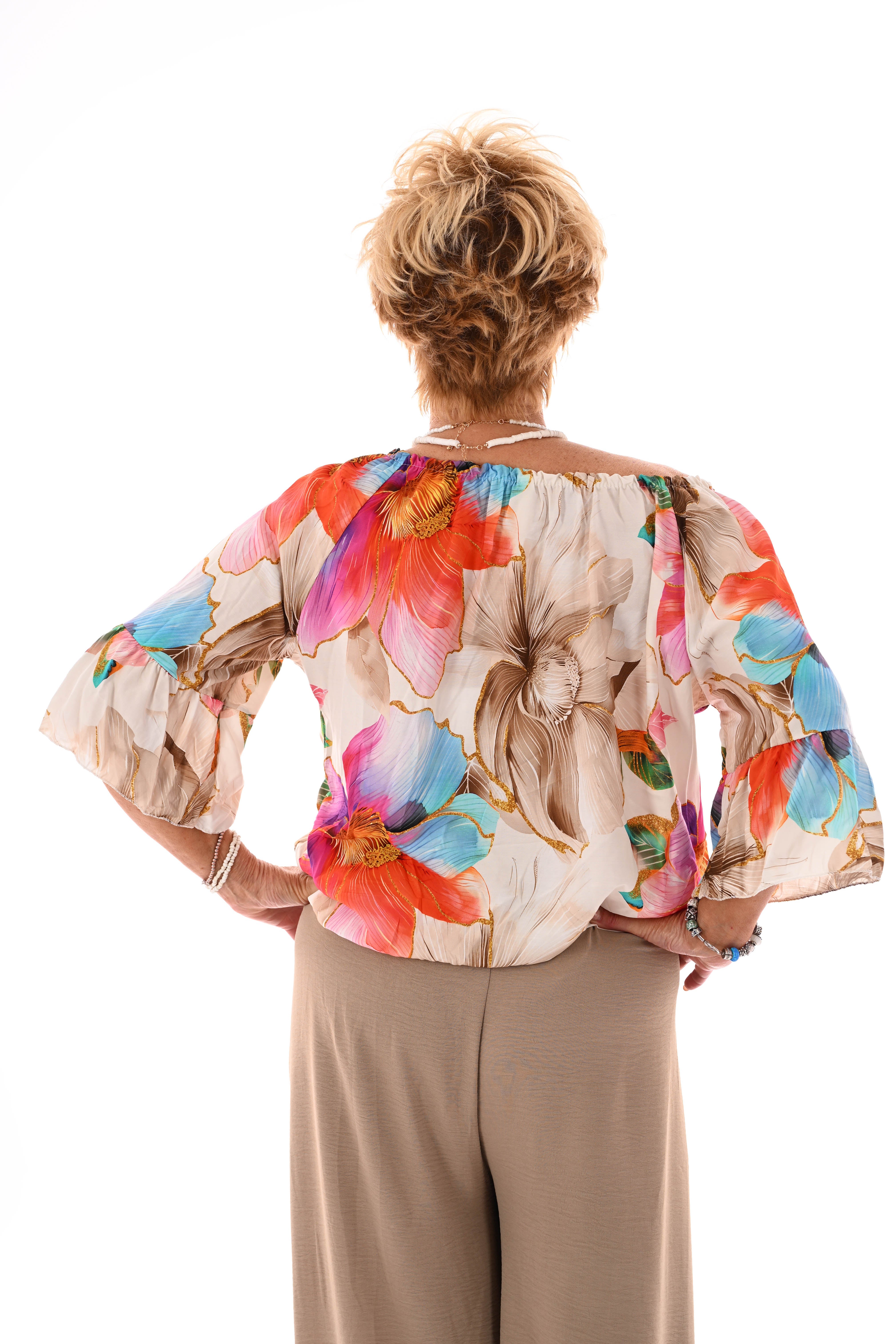 Blouse met bloemen en trompetmouwen beige