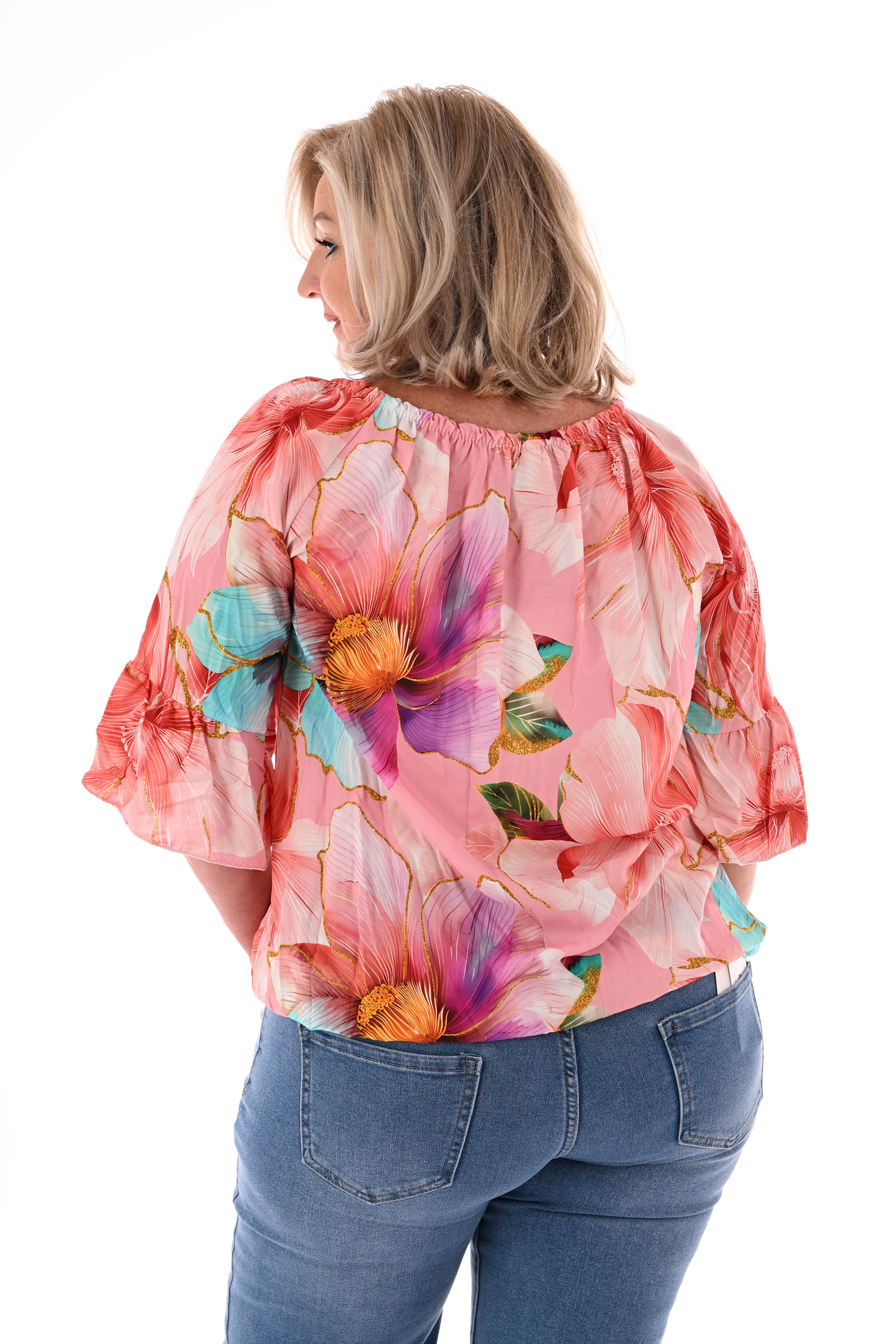Blouse met bloemen en trompetmouwen lichtroze