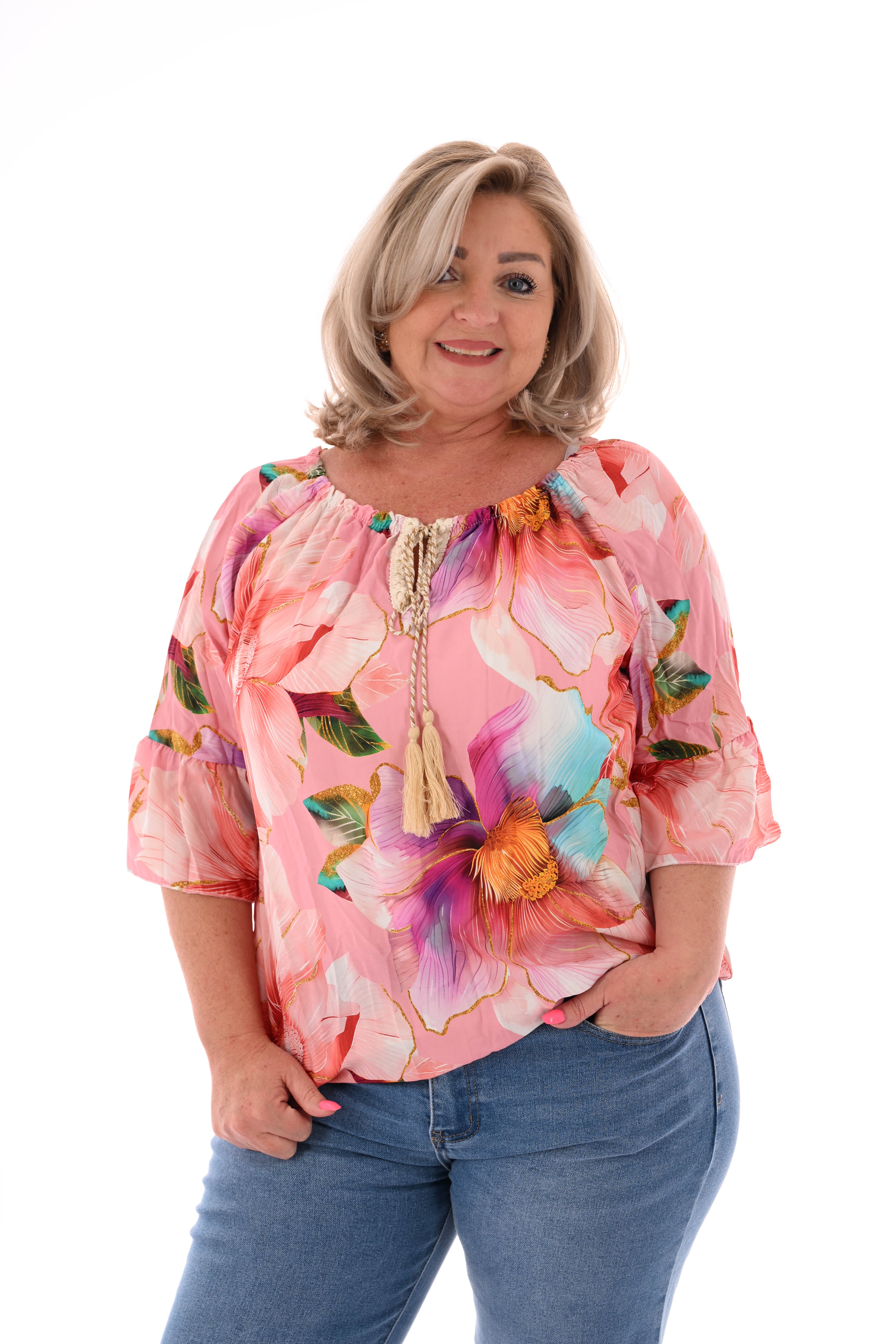 Blouse met bloemen en trompetmouwen lichtroze