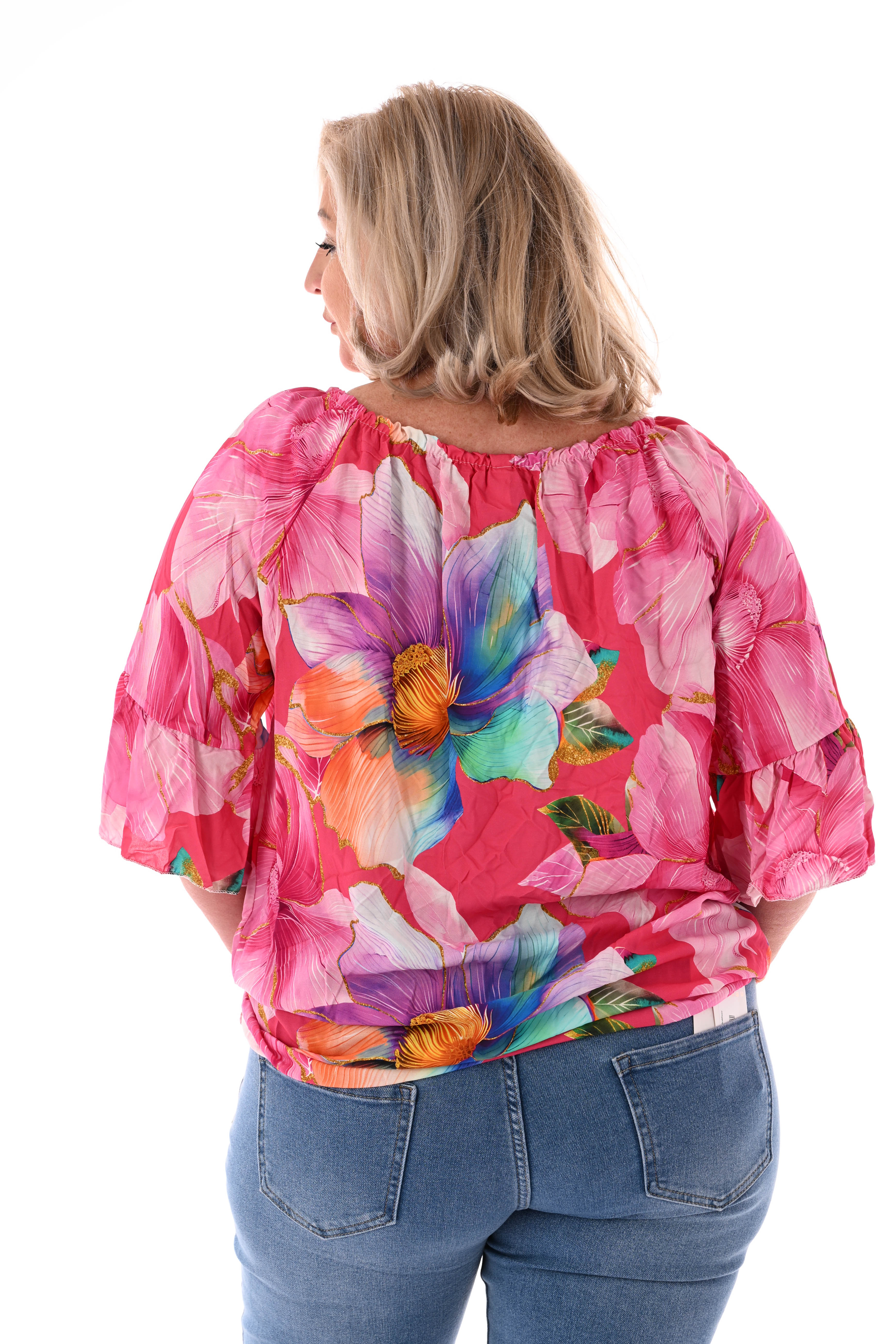 Blouse met bloemen en trompetmouwen fuchsia