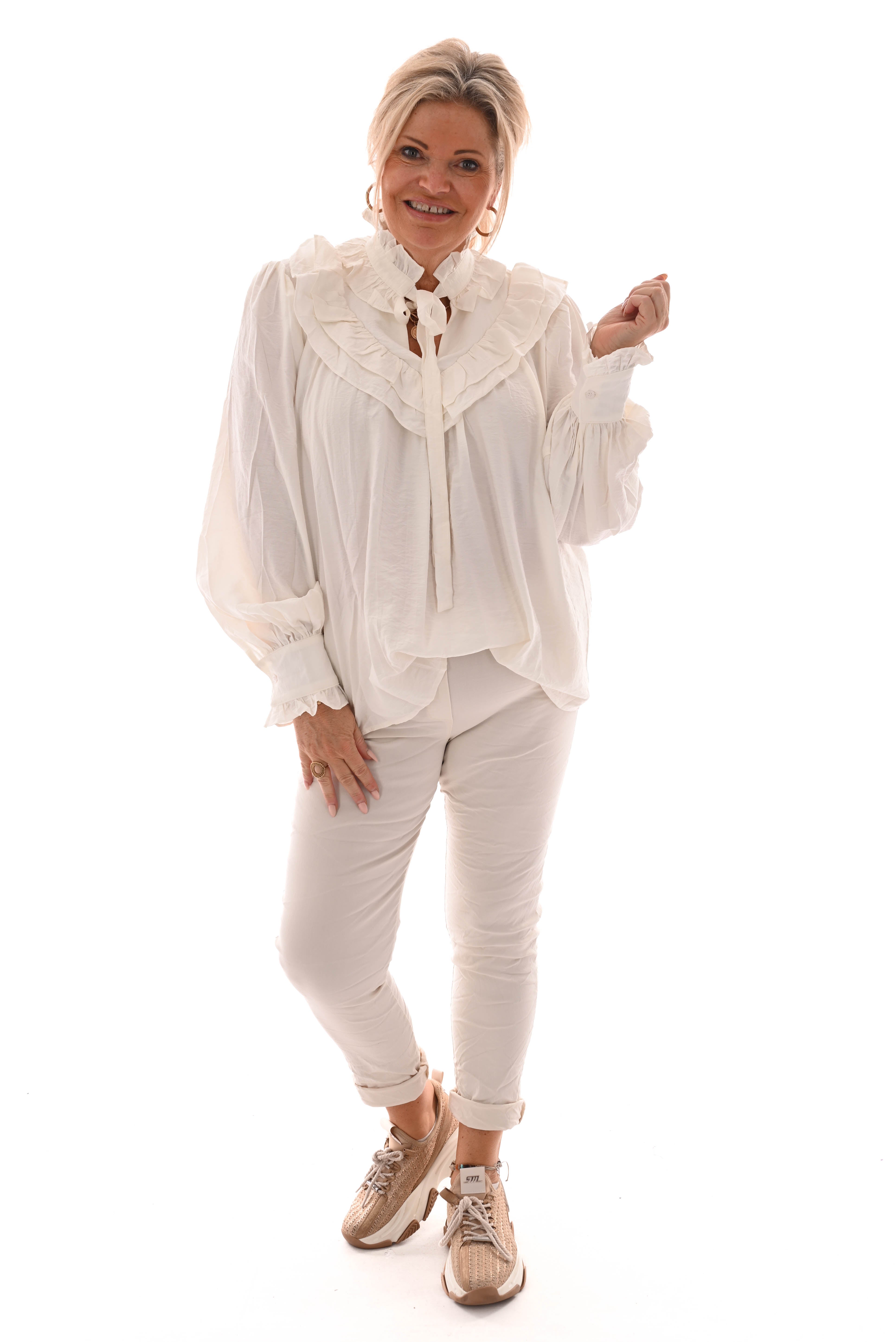 Blouse met strik en roezels roomwit