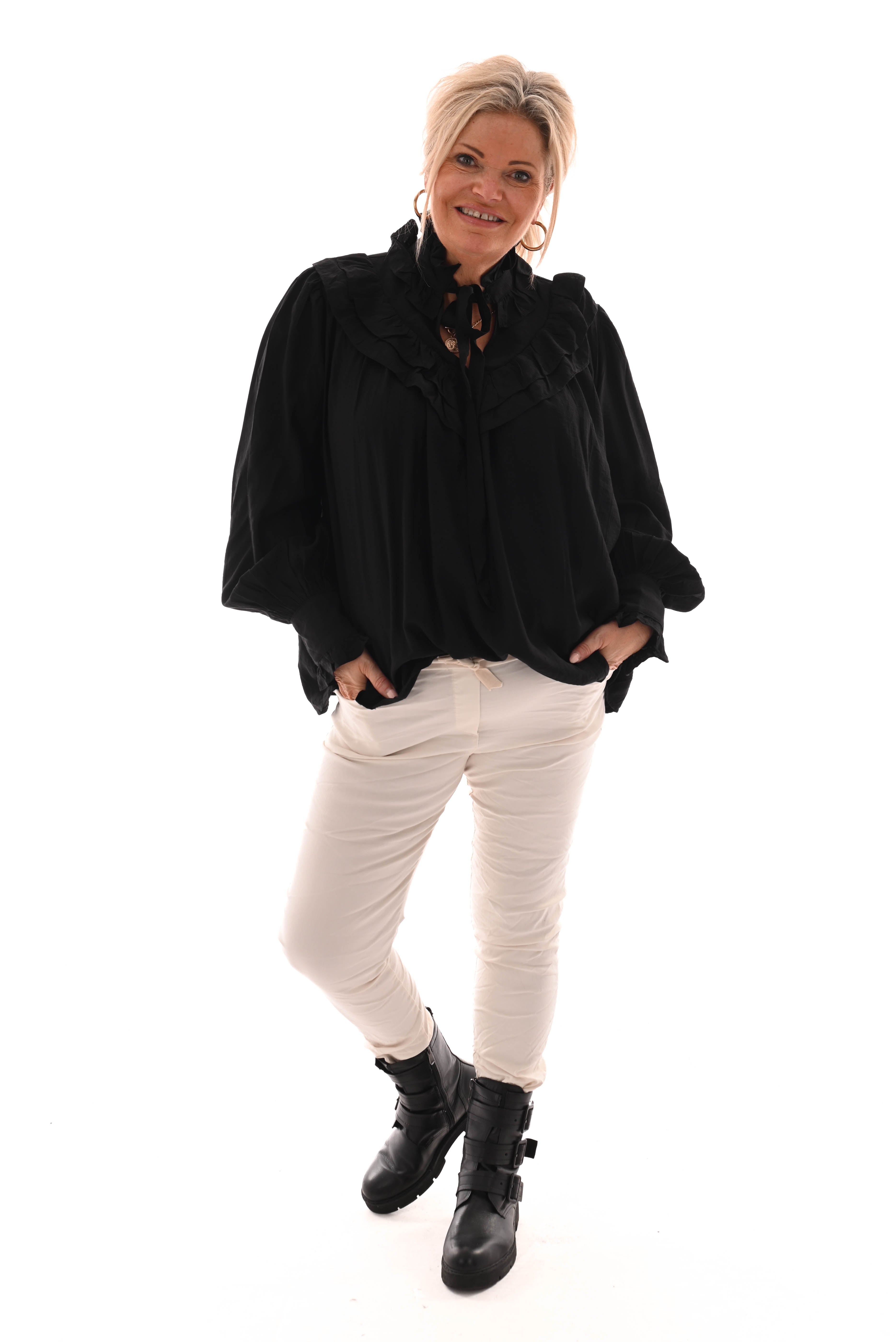 Blouse met strik en roezels zwart