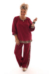 Tweedelig pak met panterbies bordeaux