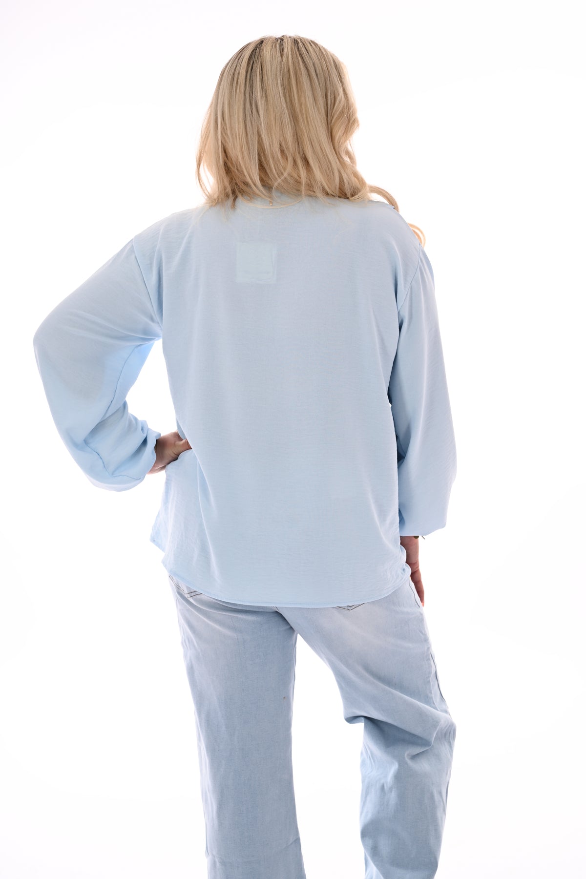 Top roezels lange mouwen lichtblauw