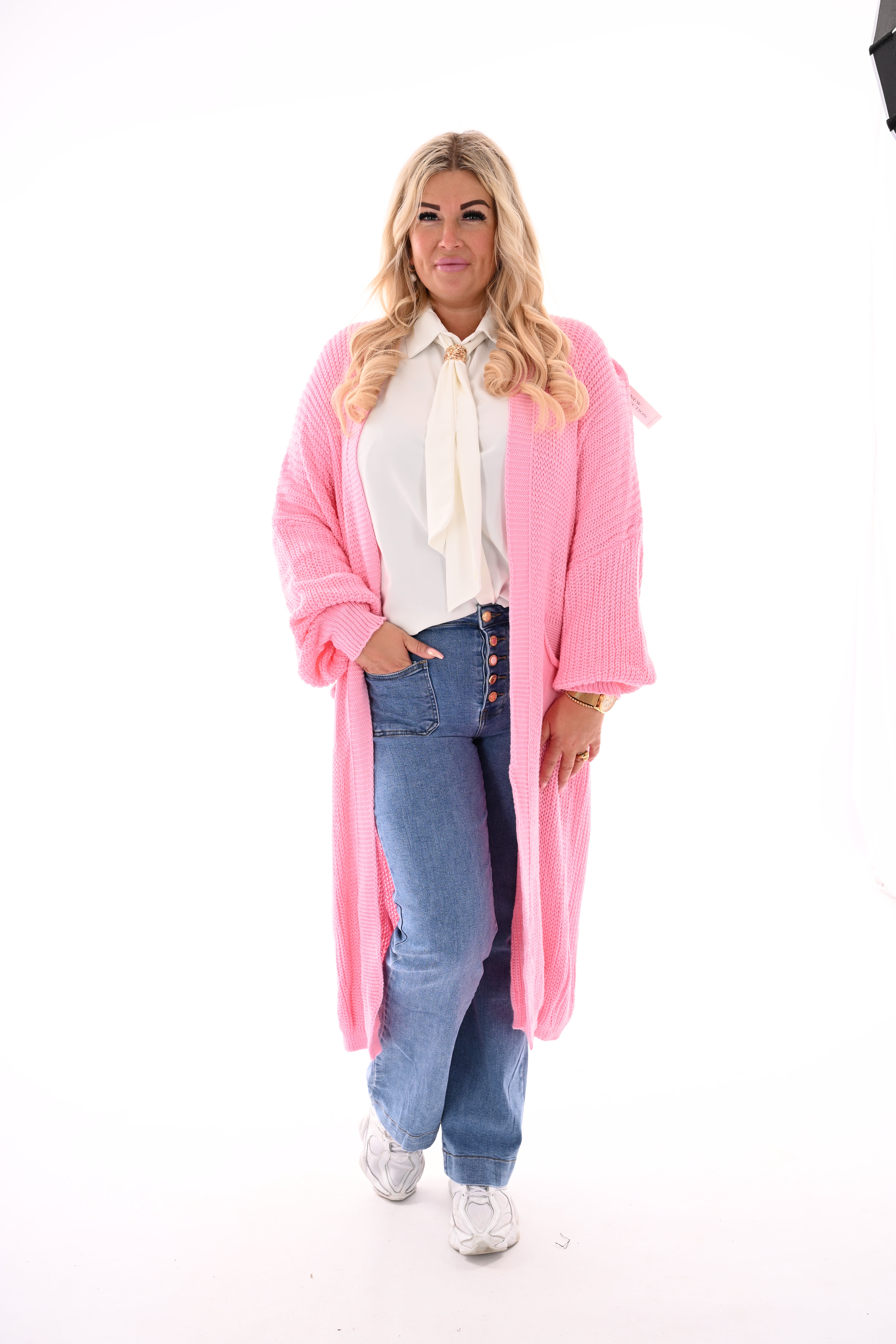 Lang gebreid vest met zakken lichtroze