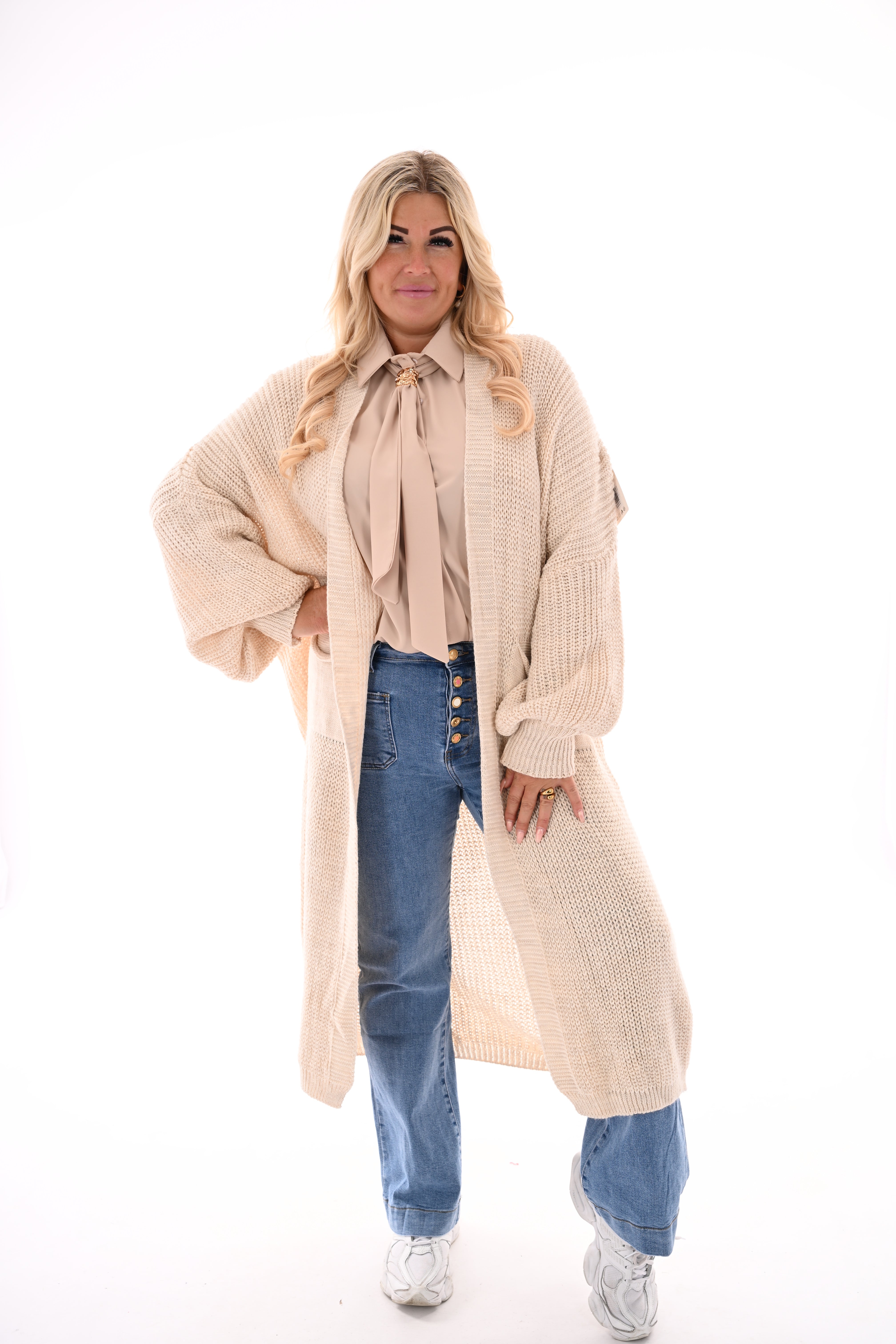 Lang gebreid vest met zakken beige