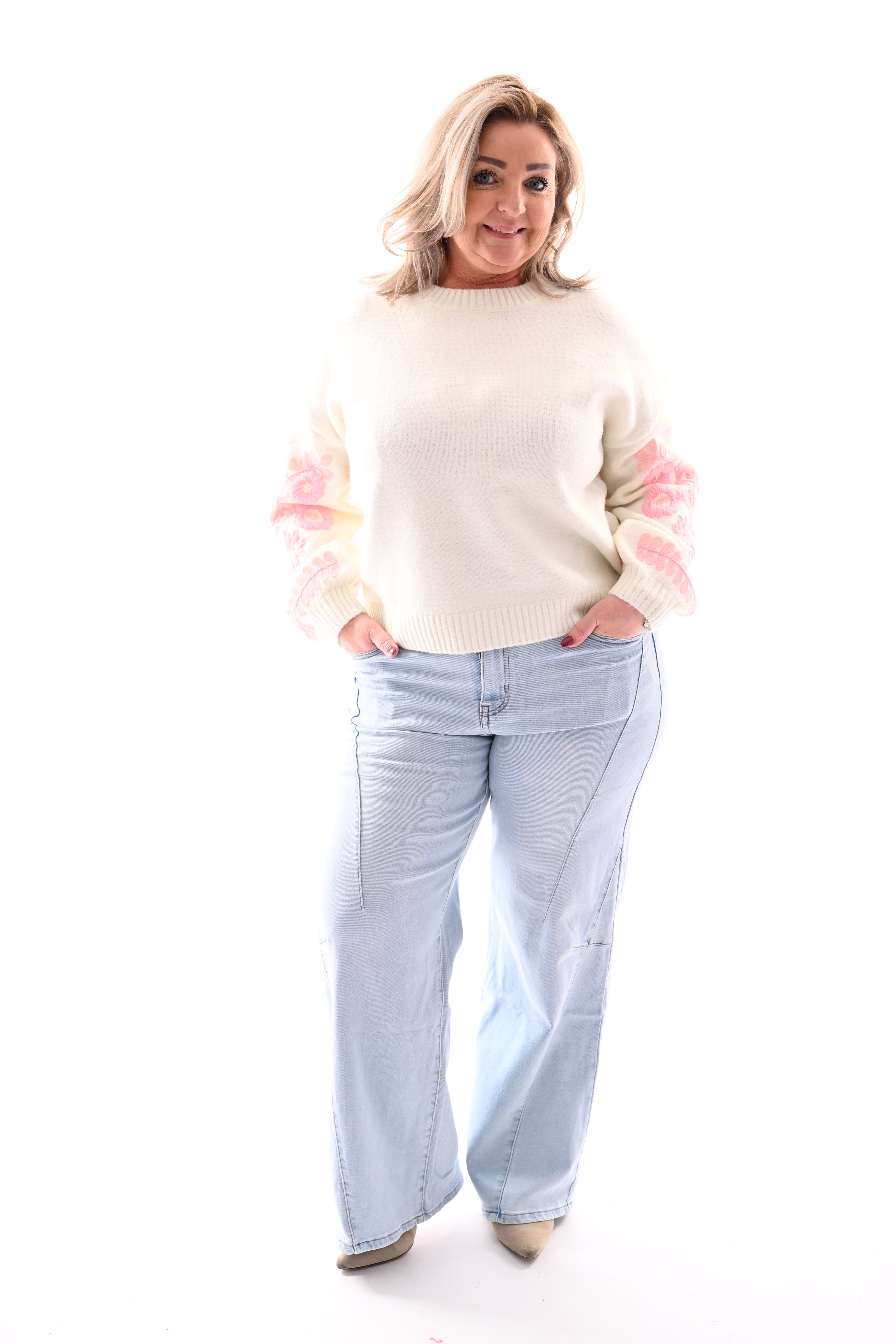 Fijn gebreide trui mouw detail creme