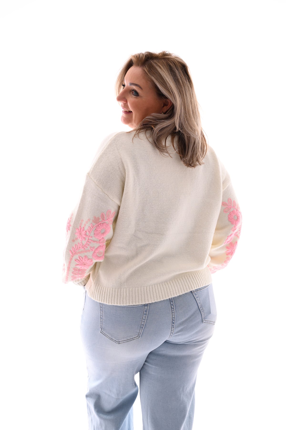 Fijn gebreide trui mouw detail creme