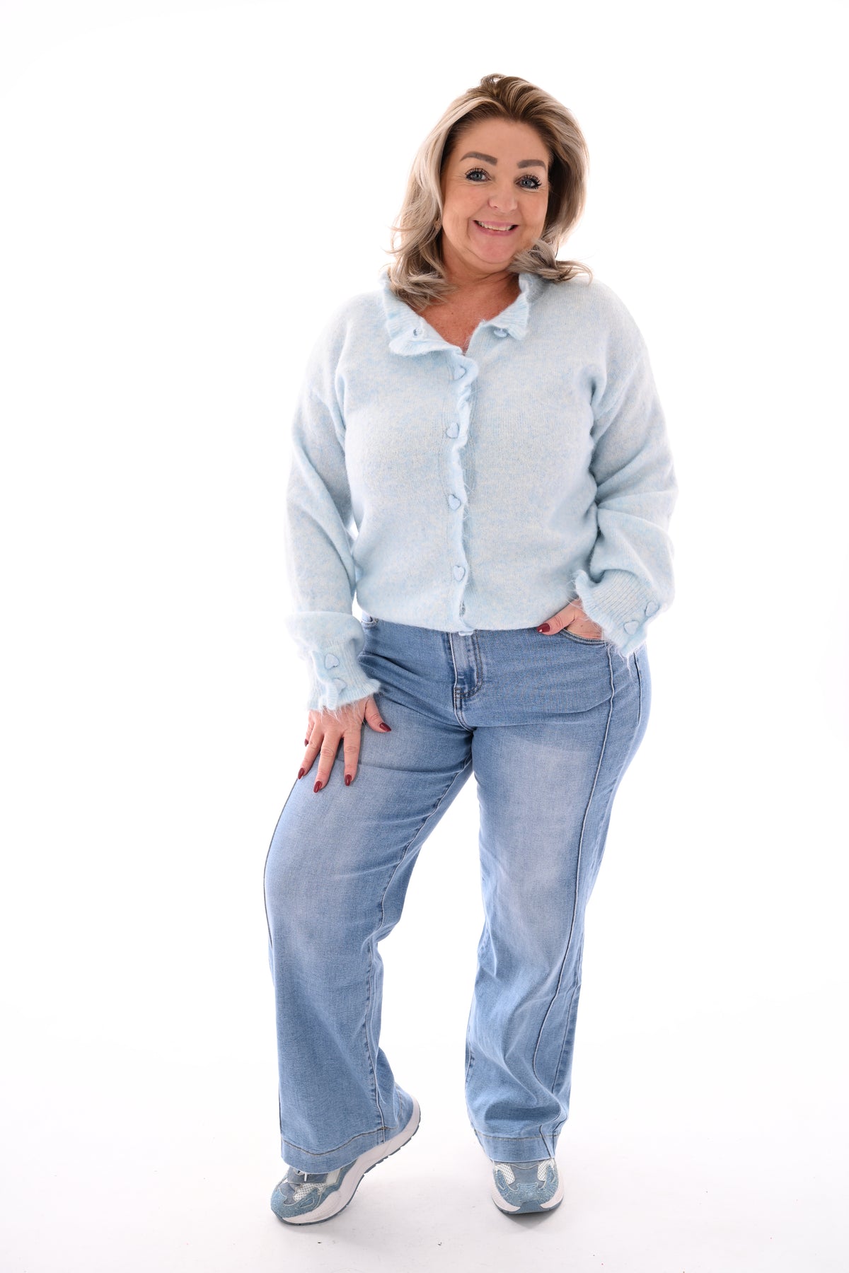 Vest knopen met roezelmouwen lichtblauw