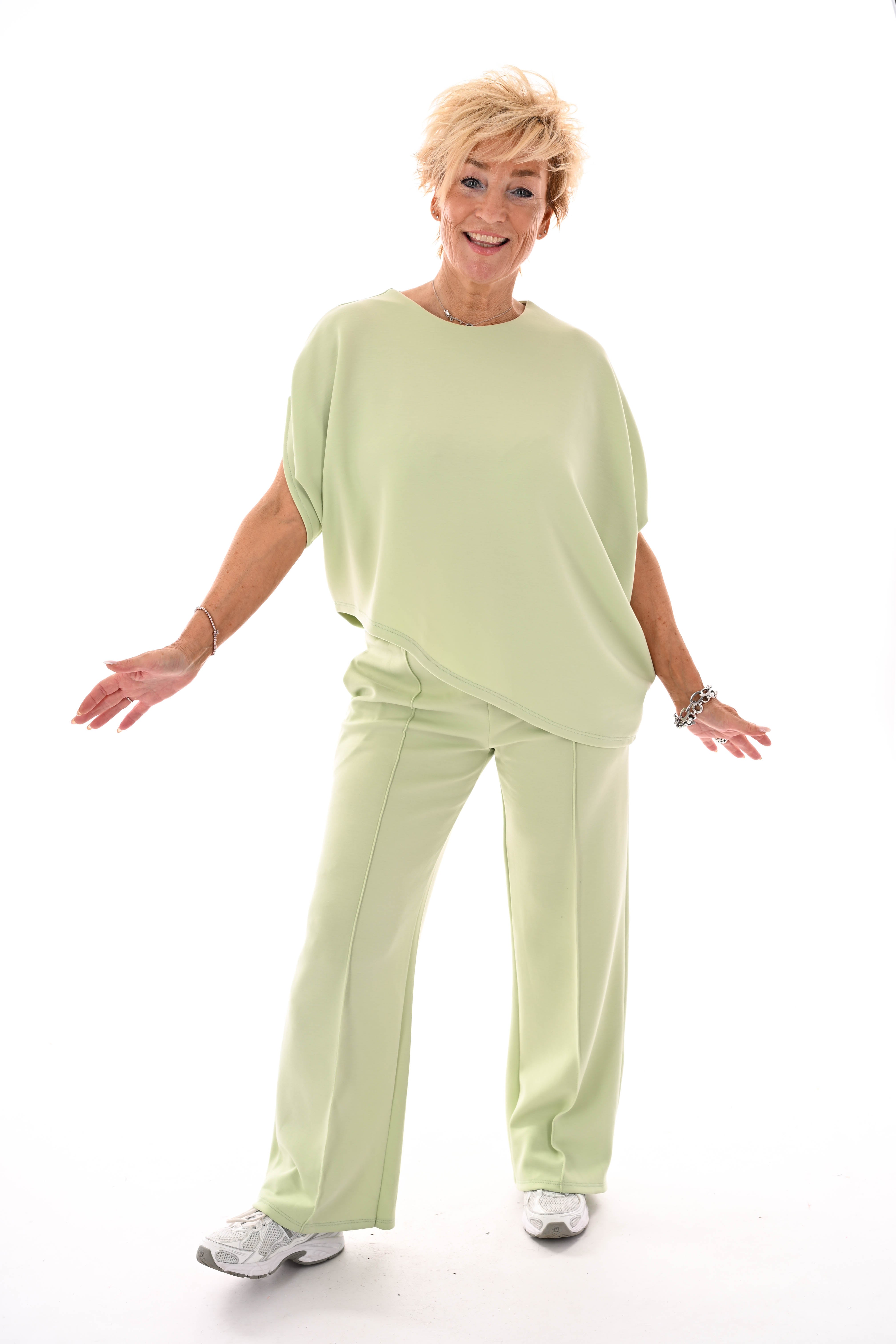 Tweedelig set asymmetrisch korte mouwen lichtgroen