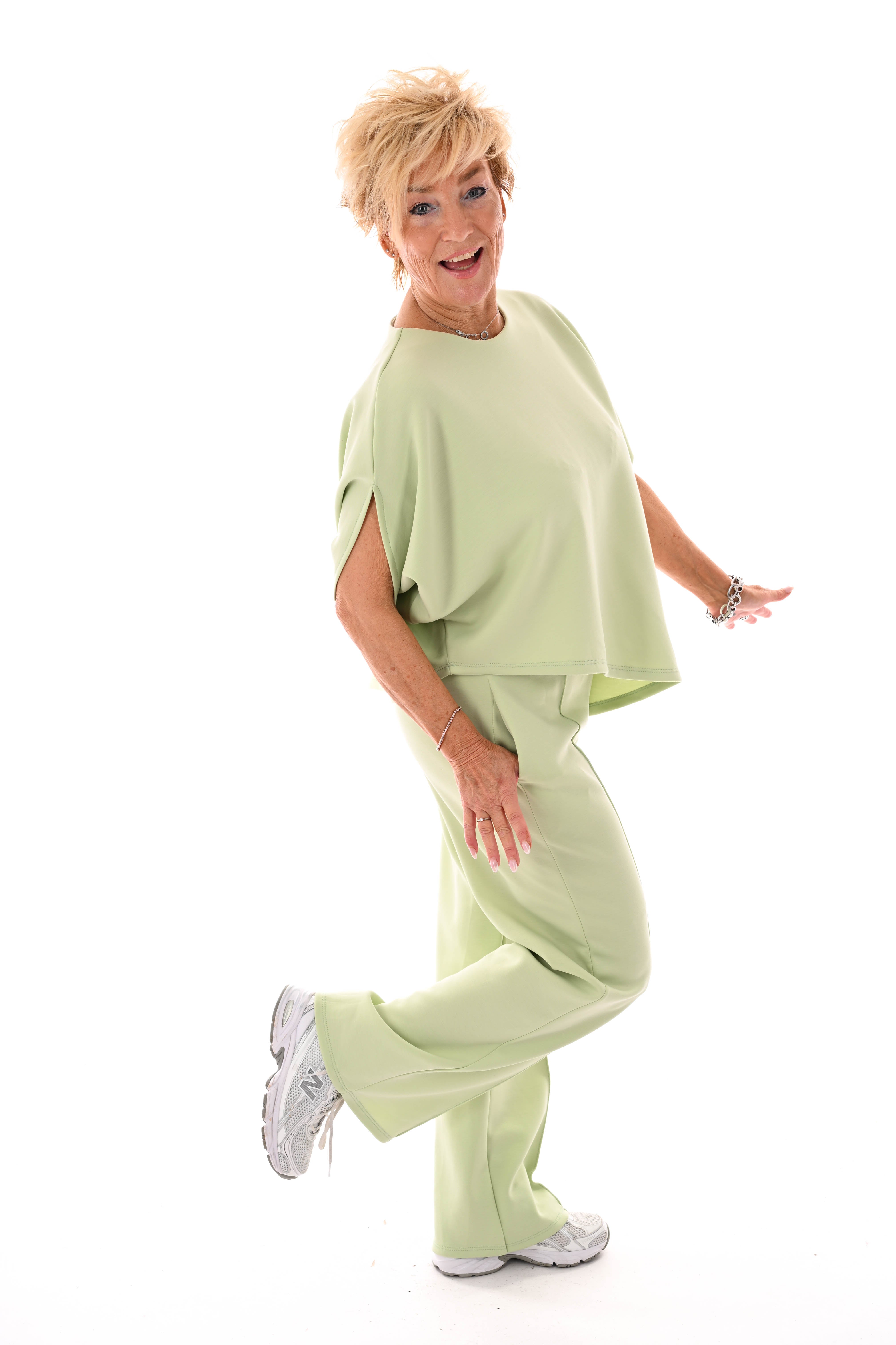 Tweedelig set asymmetrisch korte mouwen lichtgroen