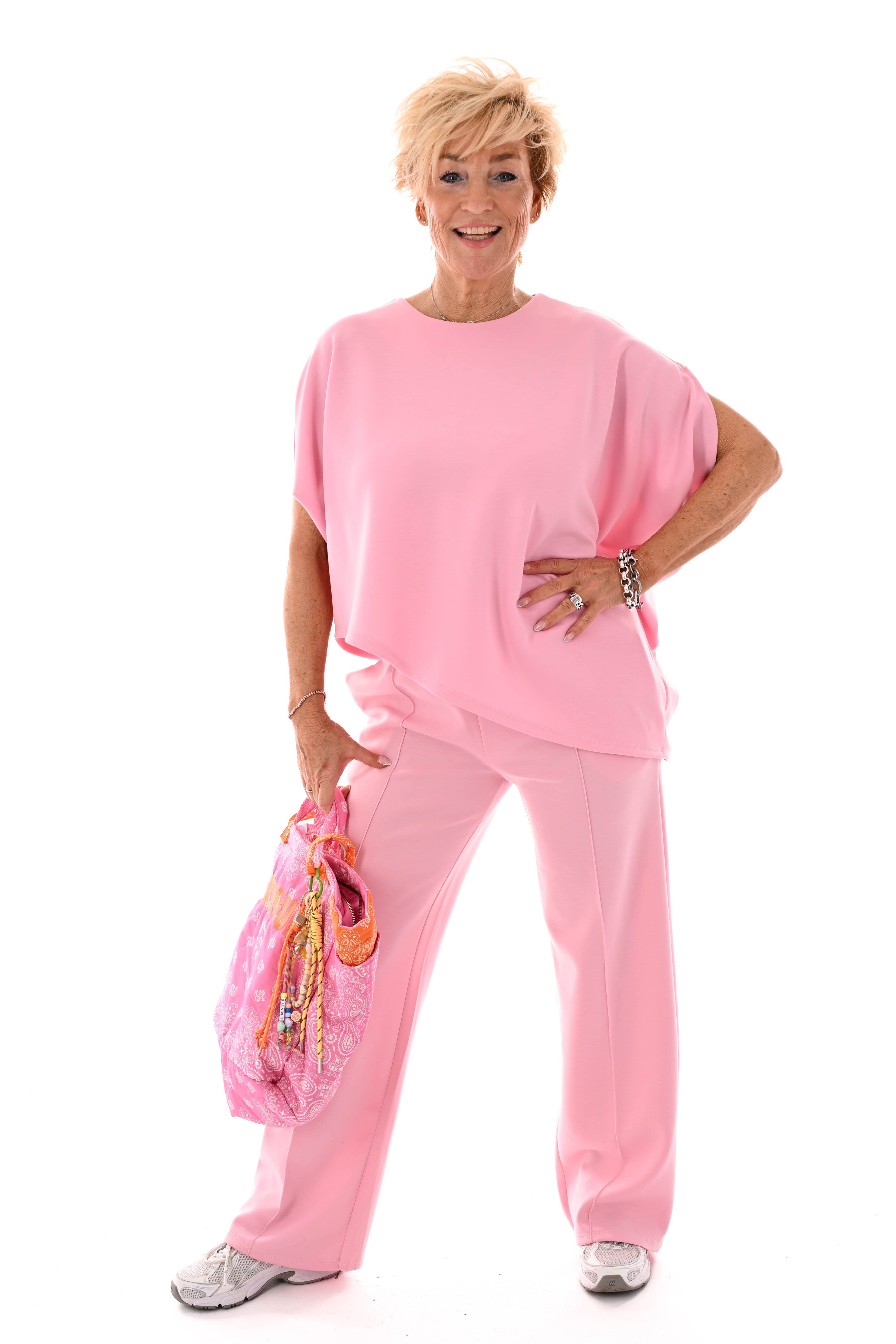 Tweedelig set asymmetrisch korte mouwen lichtroze