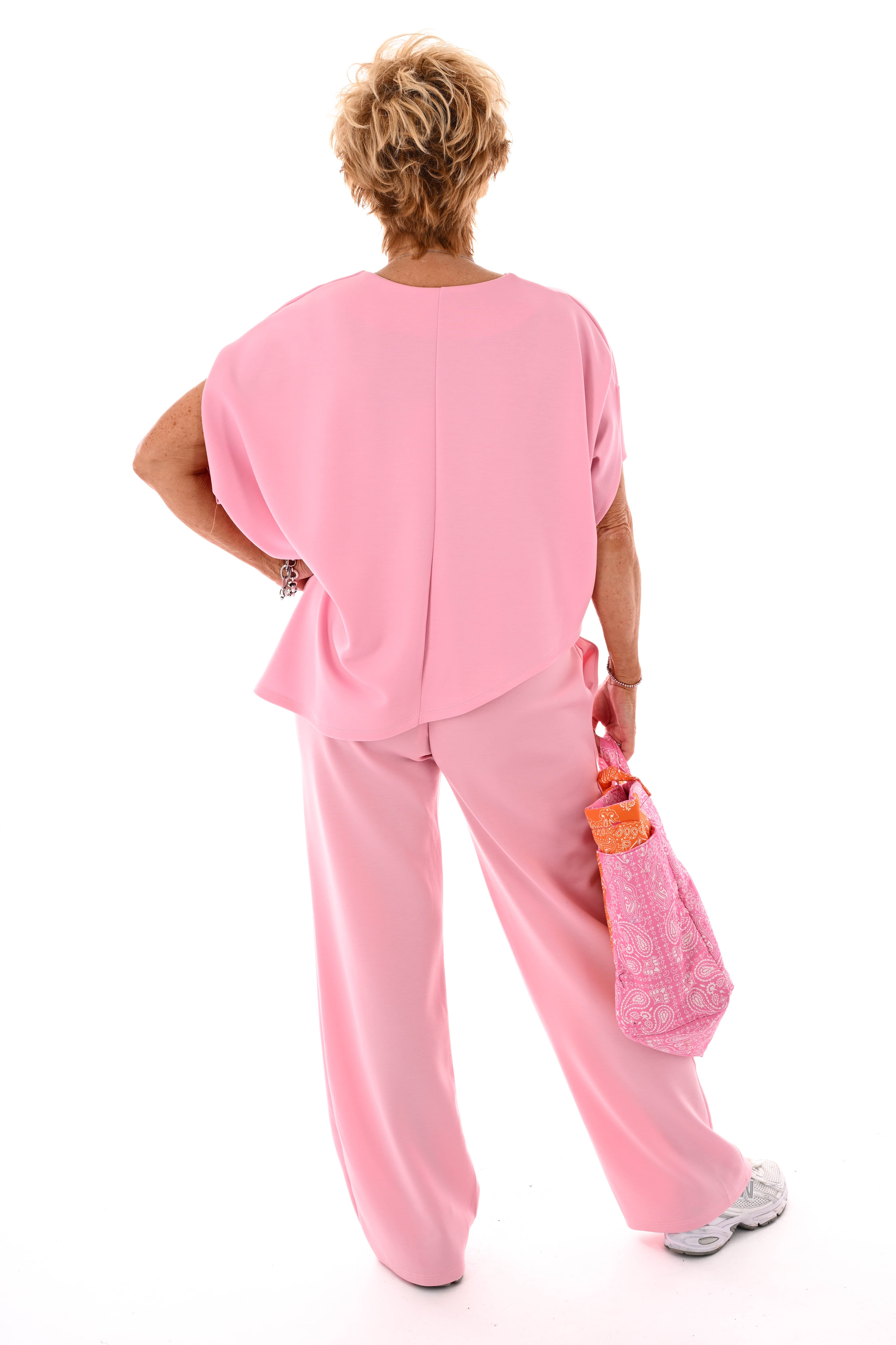 Tweedelig set asymmetrisch korte mouwen lichtroze