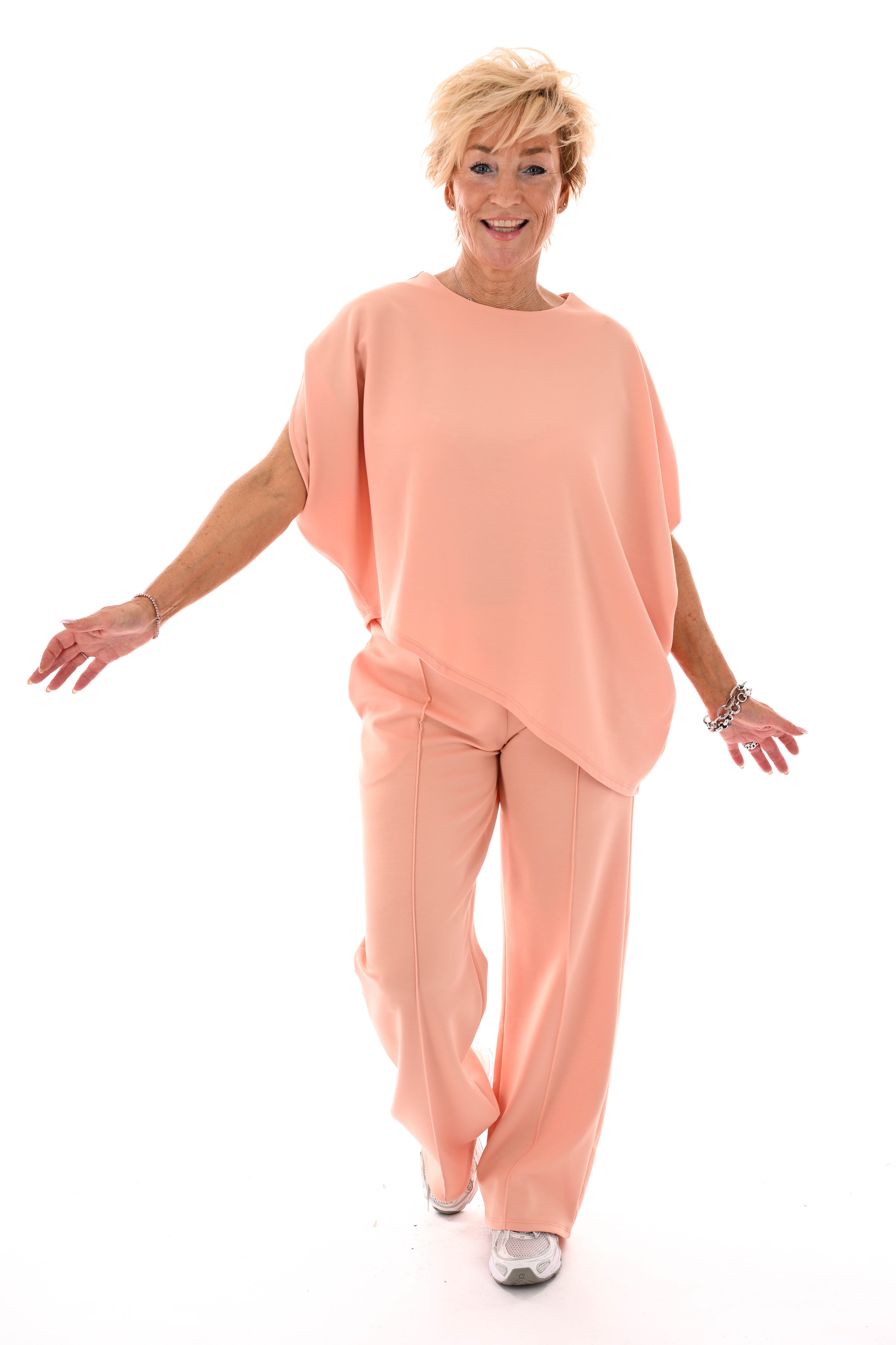 Tweedelig set asymmetrisch korte mouwen peach