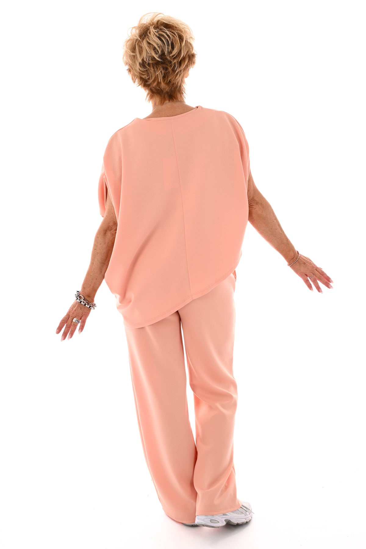 Tweedelig set asymmetrisch korte mouwen peach