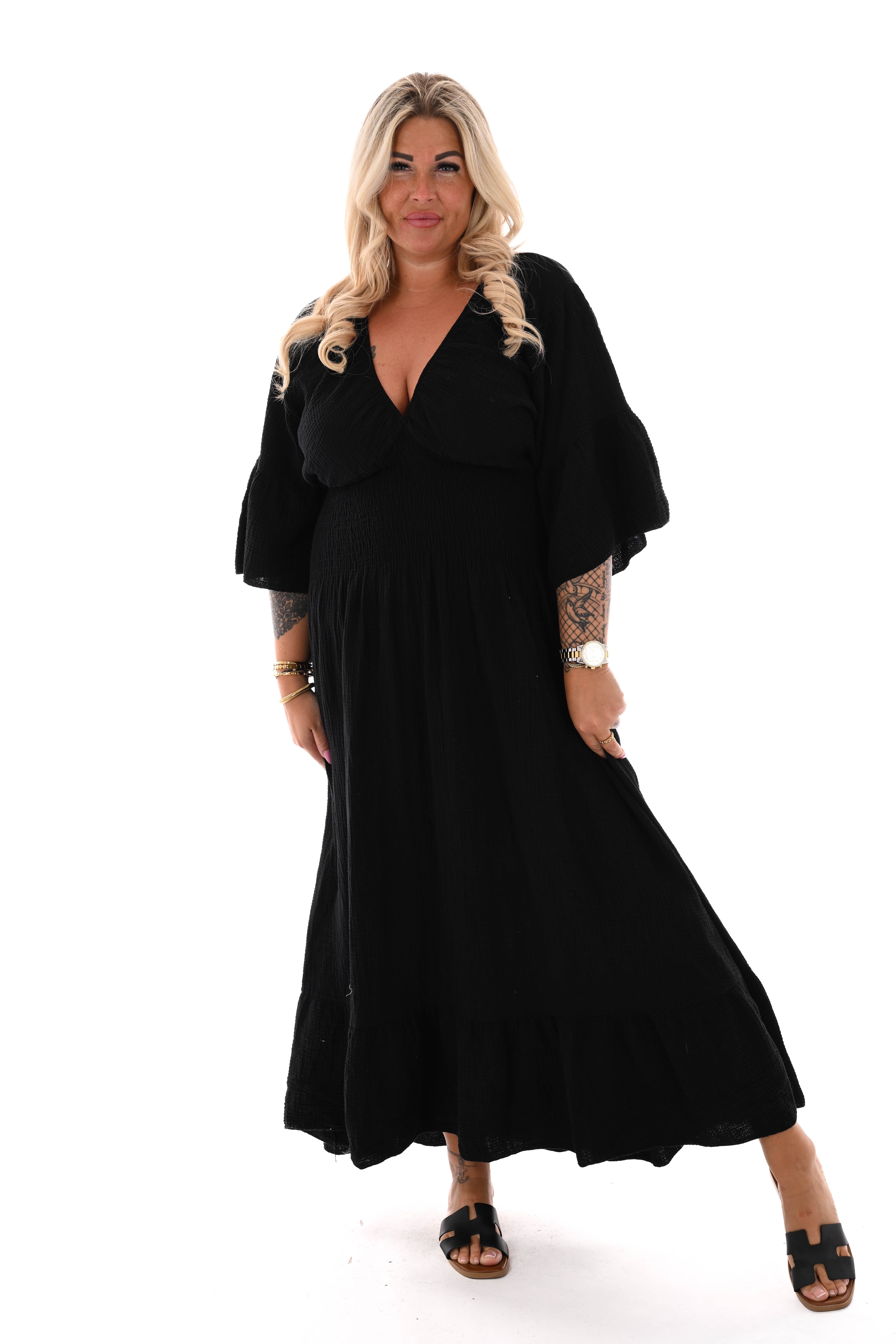 Lange wafeljurk v-hals trompetmouwen zwart
