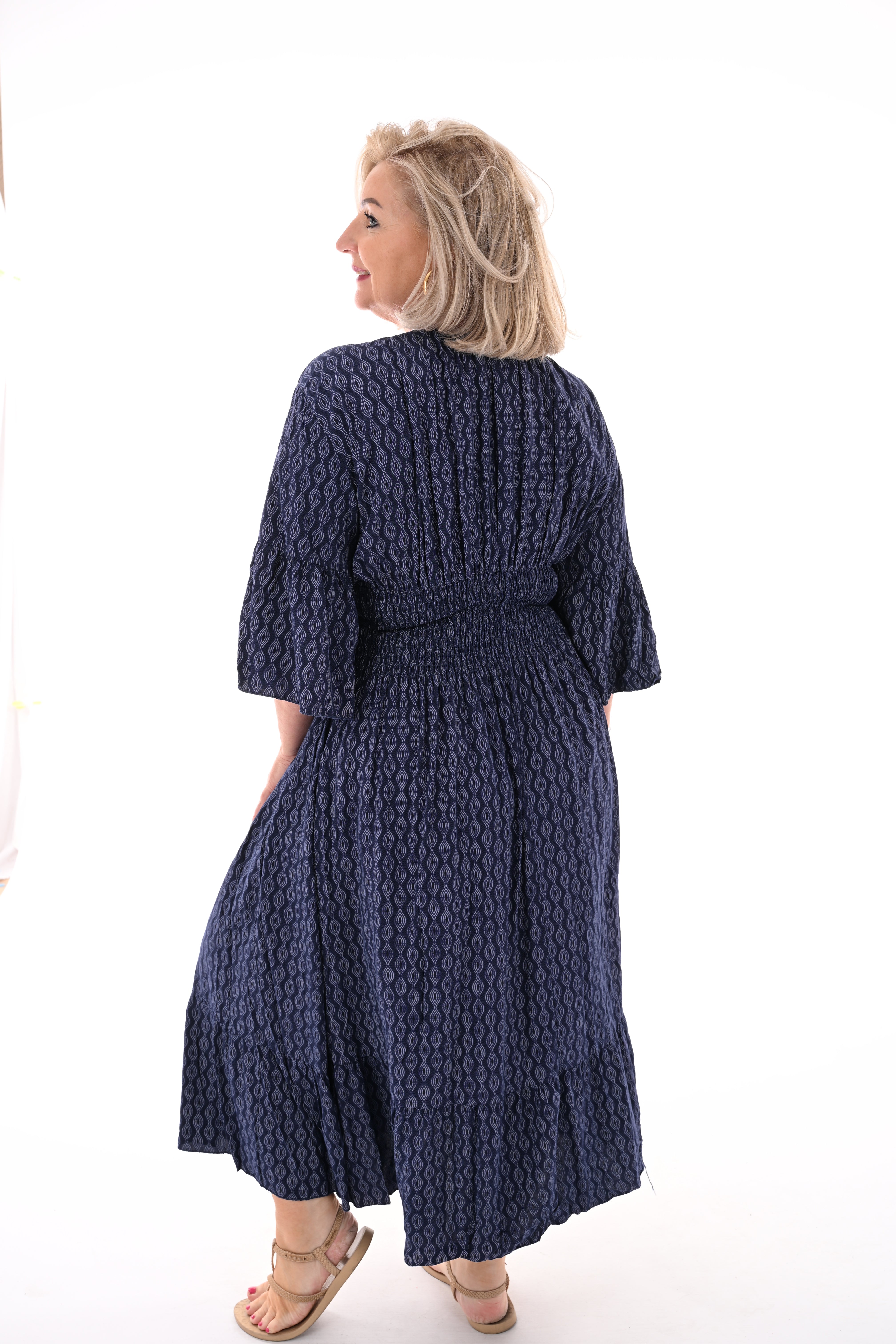 Midi jurk v-hals wave patroon marineblauw