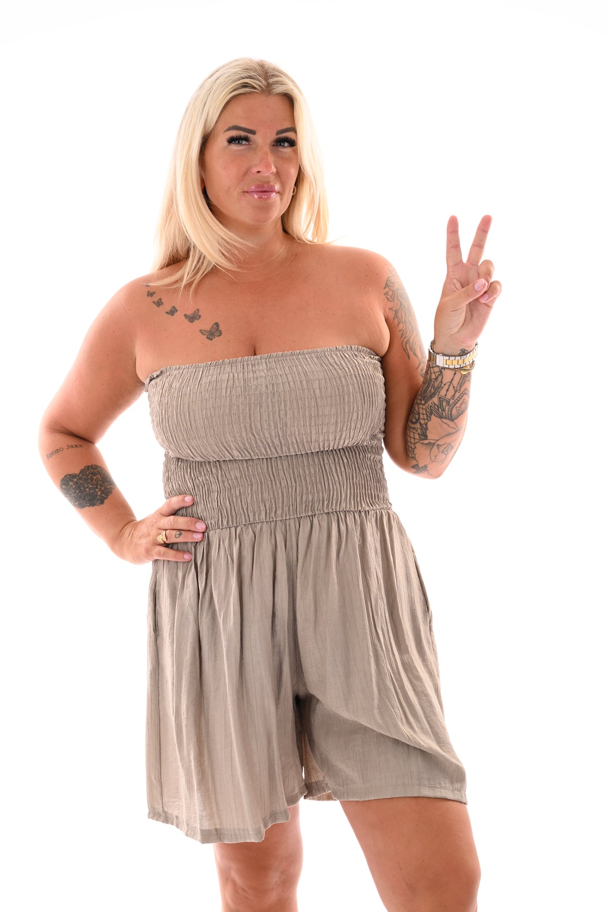 Strapless playsuit met zakken taupe